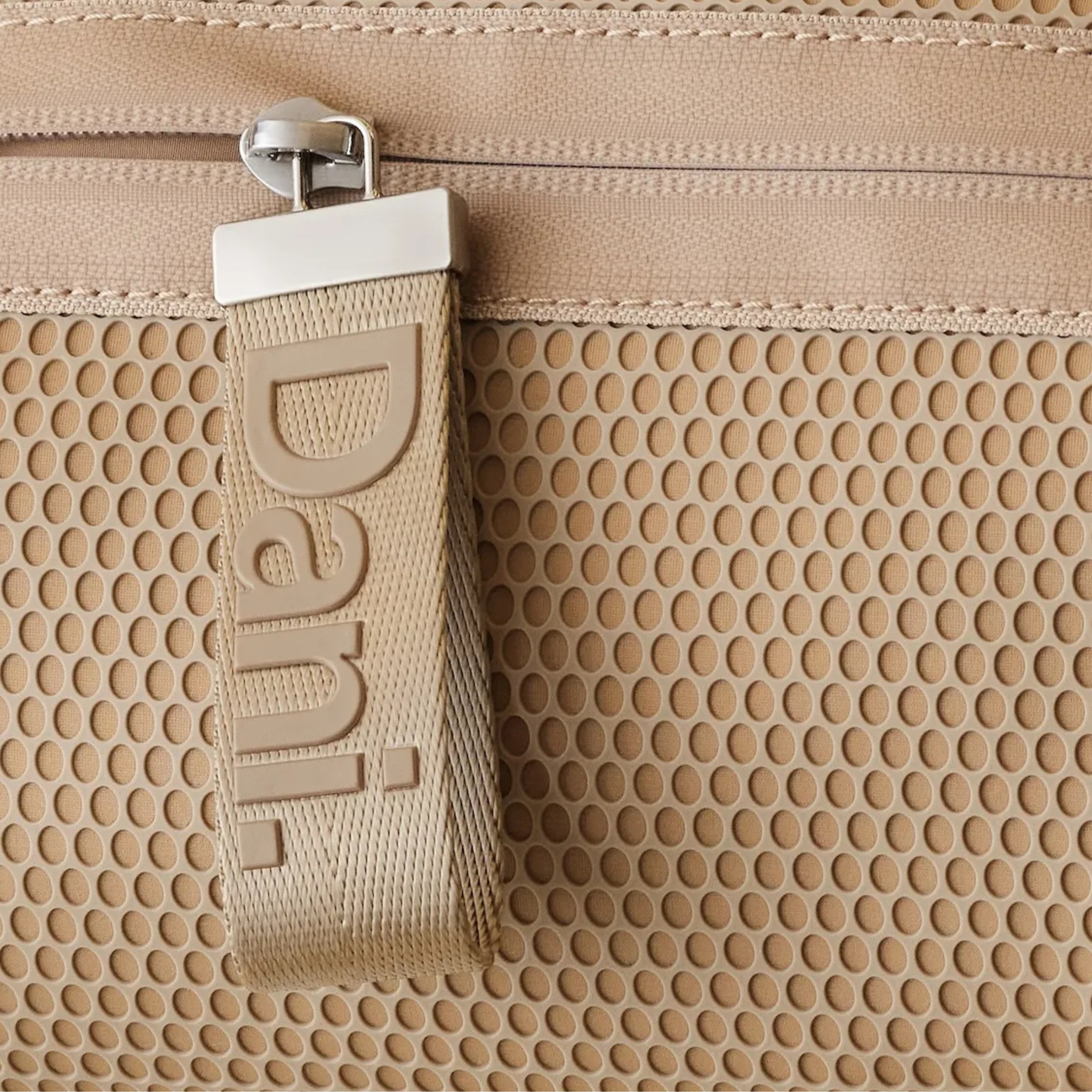 Daniella Lehavi Bonnie crossbody bag with sleek leather strap and minimalist design, black color, and compact shape.
