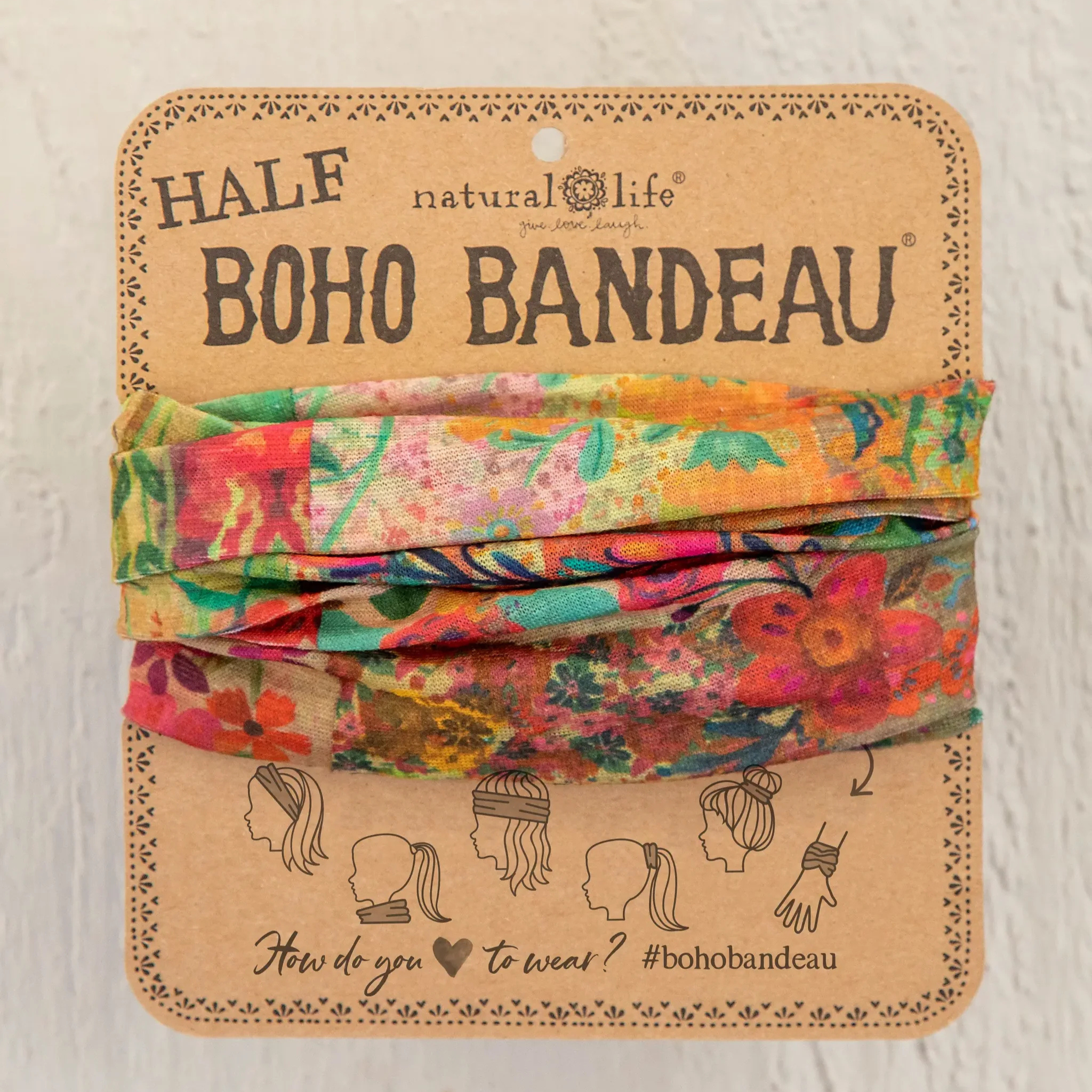 Pink patchwork half Boho Bandeau® headband by Natural Life, showcasing vibrant colors and unique fabric design.