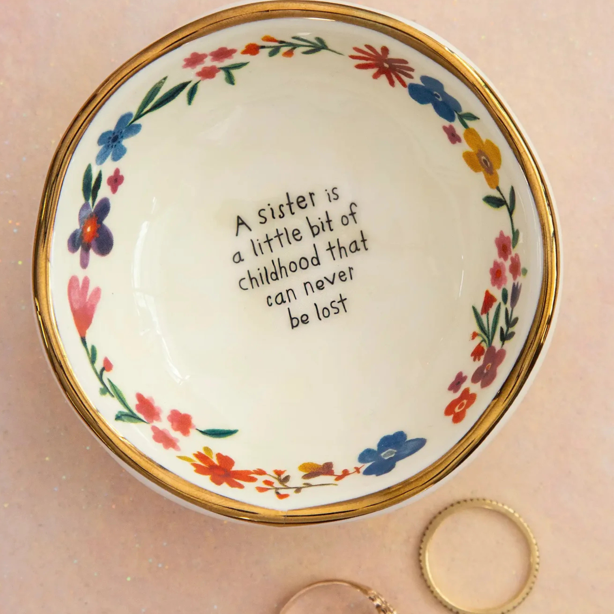 Natural Life ceramic trinket bowl featuring a heartfelt "Sister" childhood design, perfect for holding small treasures.
