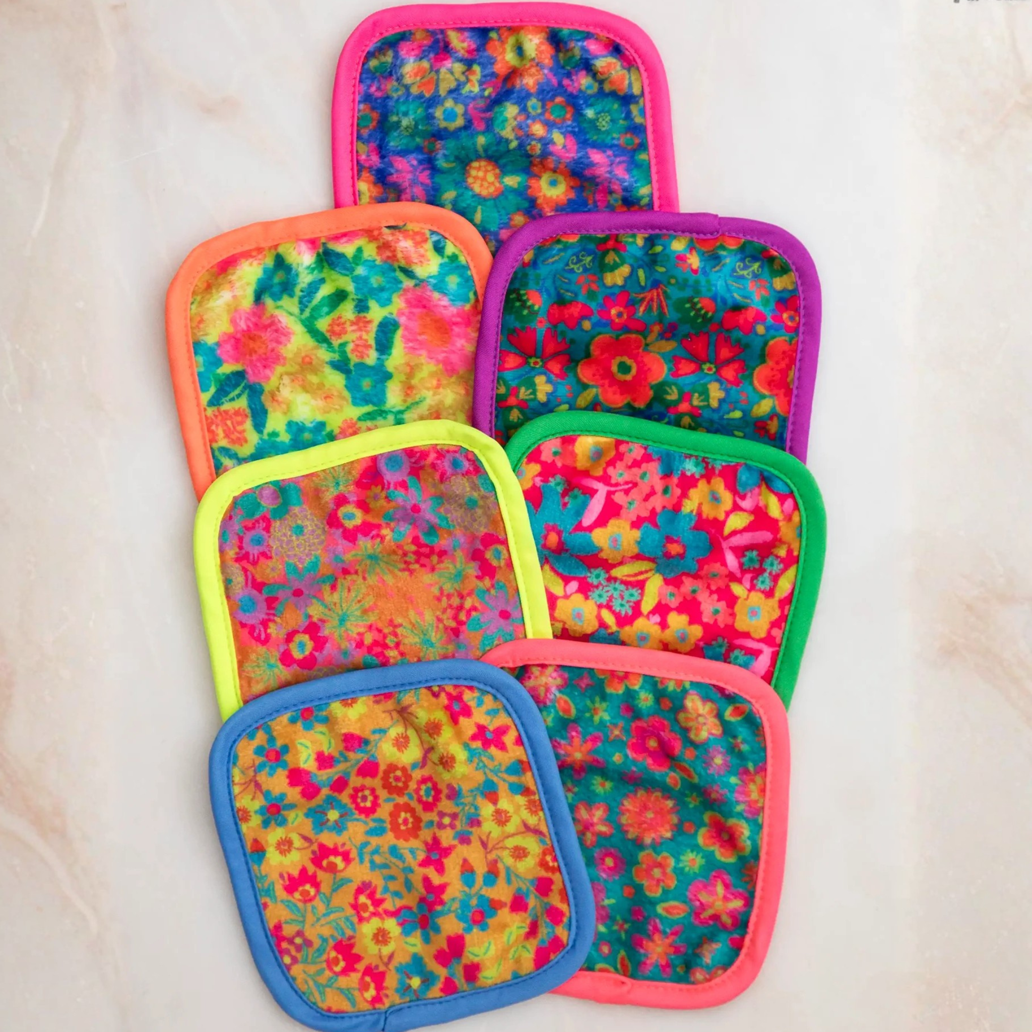 Natural Life floral mini makeup removing cloths set displayed in a vibrant, colorful arrangement on a soft background.
