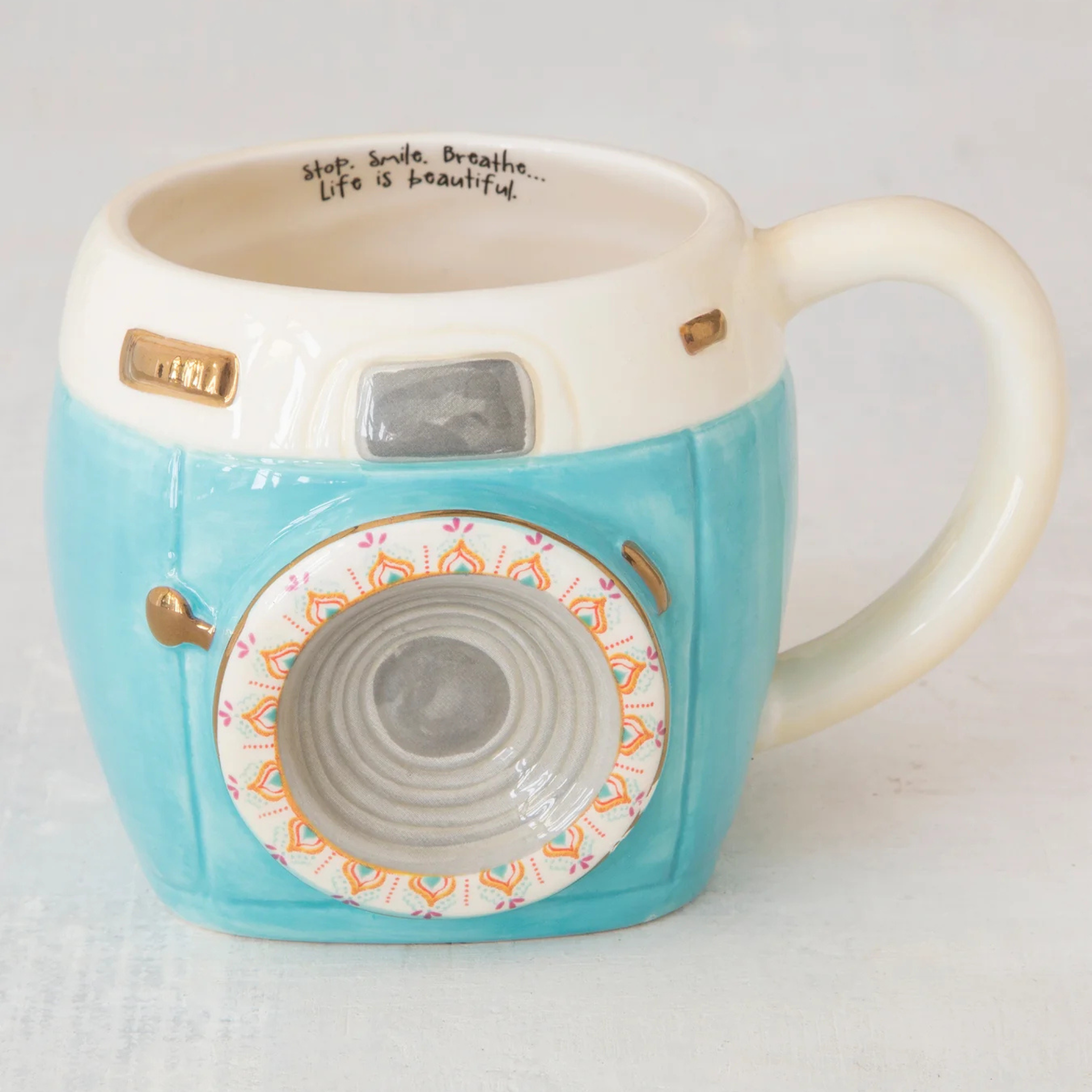 Folk Art Coffee Mug by Natural Life featuring Imogene The Camera design with colorful patterns and artistic details.