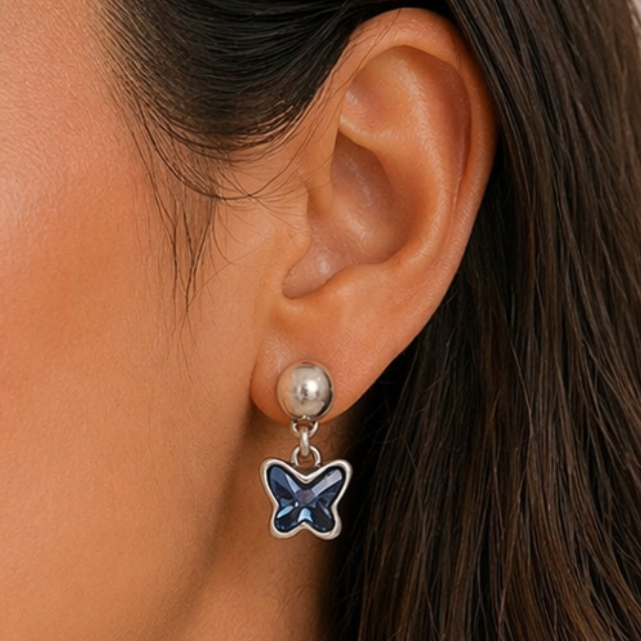 Chanour Midnight Flutter Earrings showing elegant, dark-toned earrings with fluttering feather-like design on a white background.