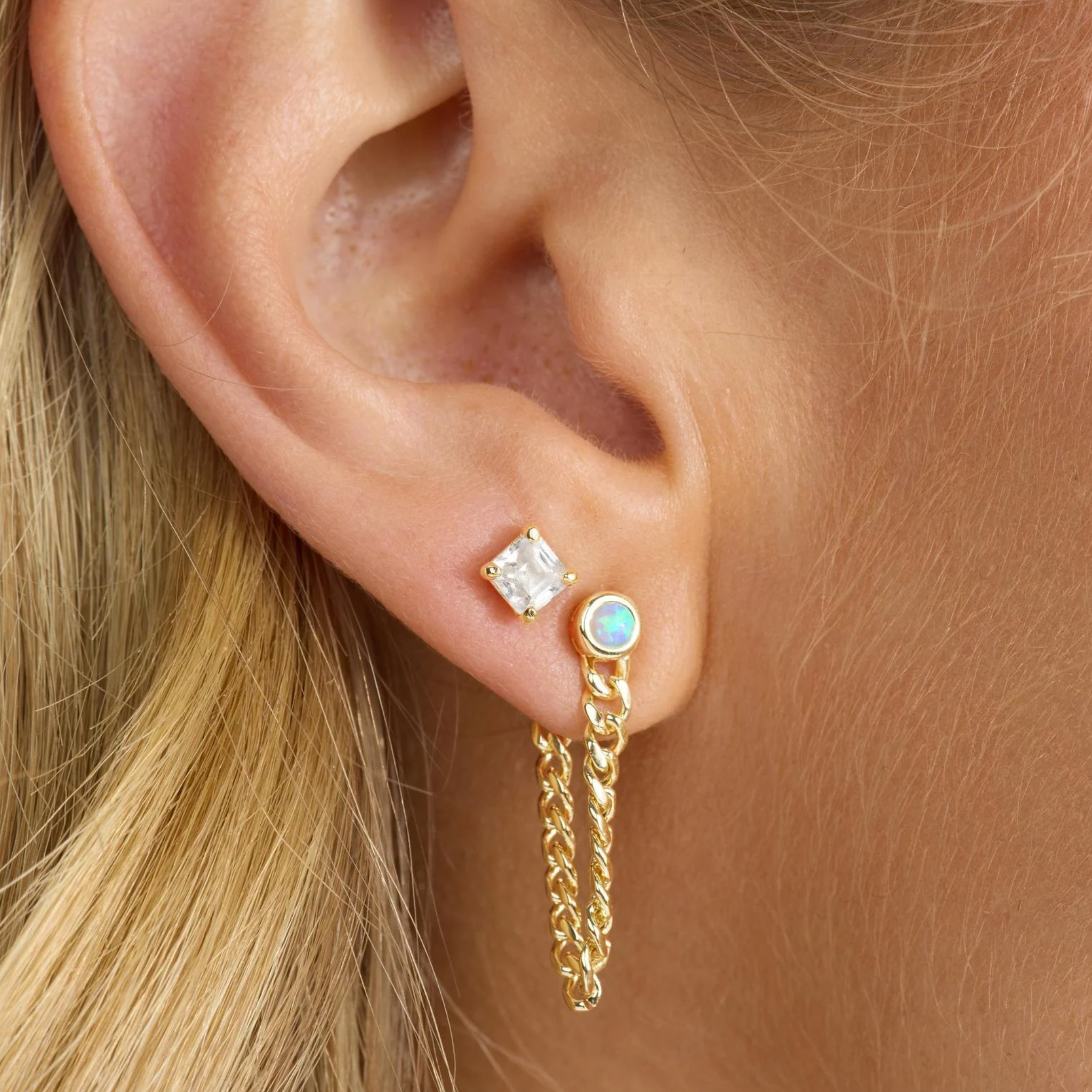 Melinda Maria Julian 3mm gold chain hoop earrings with blue opal accents, featuring a delicate, soft chain design.