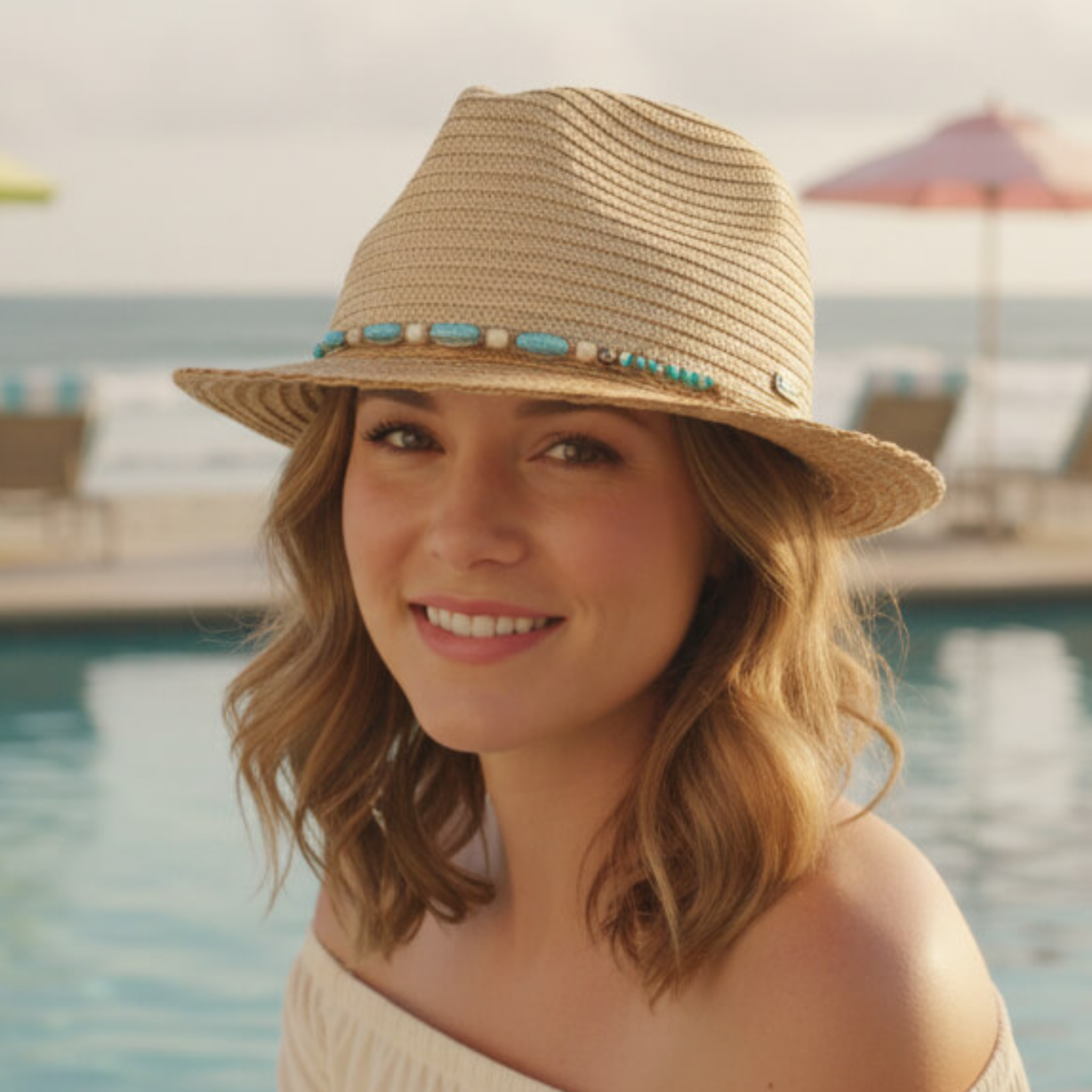Sun N Sand turquoise beads fedora hat with adjustable fit and UPF 50+ sun protection, stylish and functional accessory.