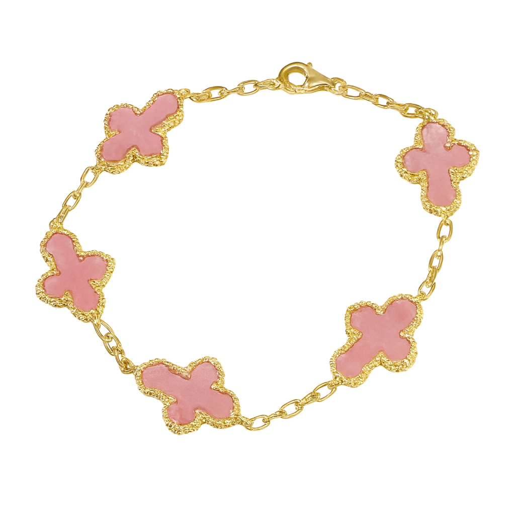 Silver multi cross bracelet by Private label featuring intricate cross designs on a delicate chain.