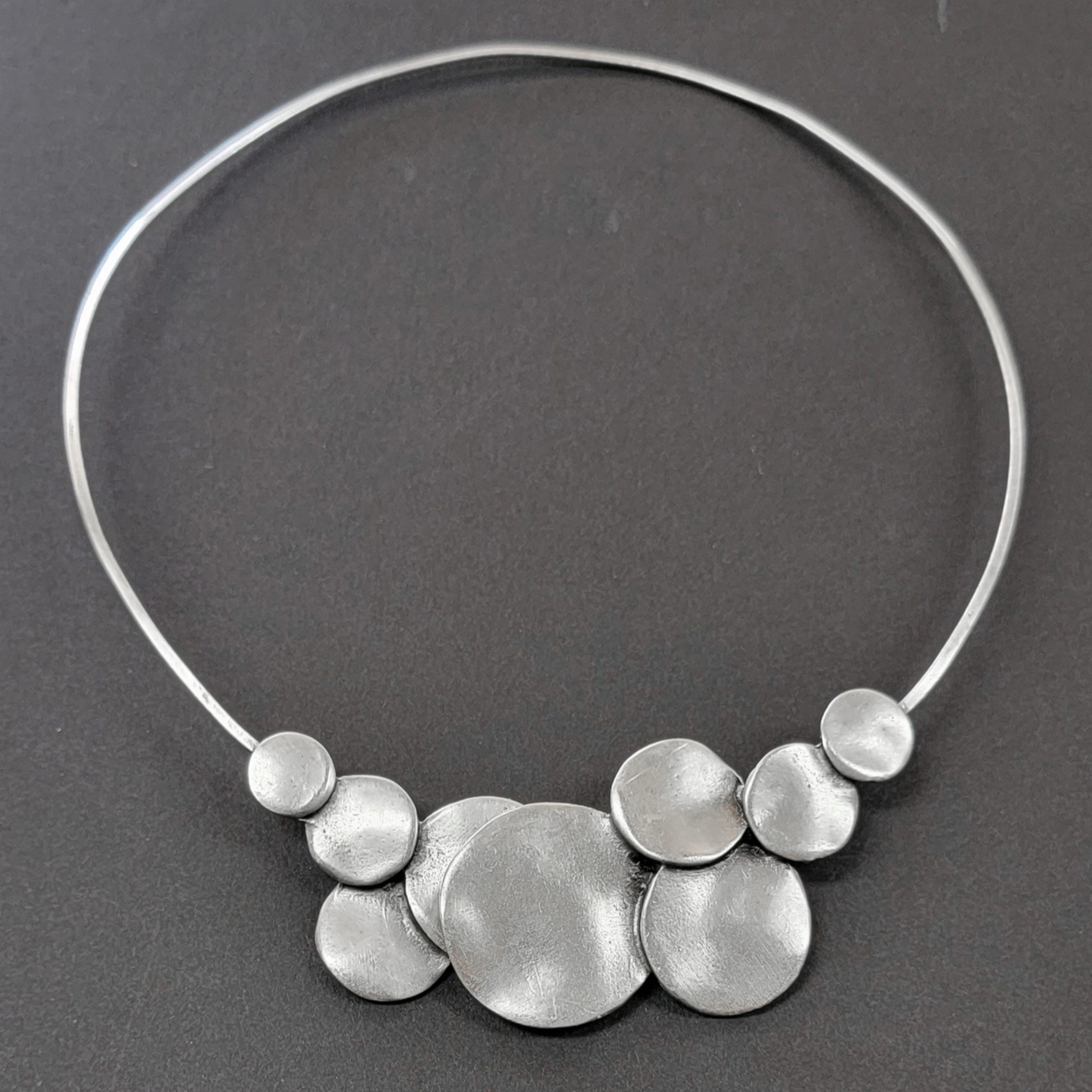 Chanour Moonphase Necklace featuring a detailed lunar phase pendant on a delicate chain.