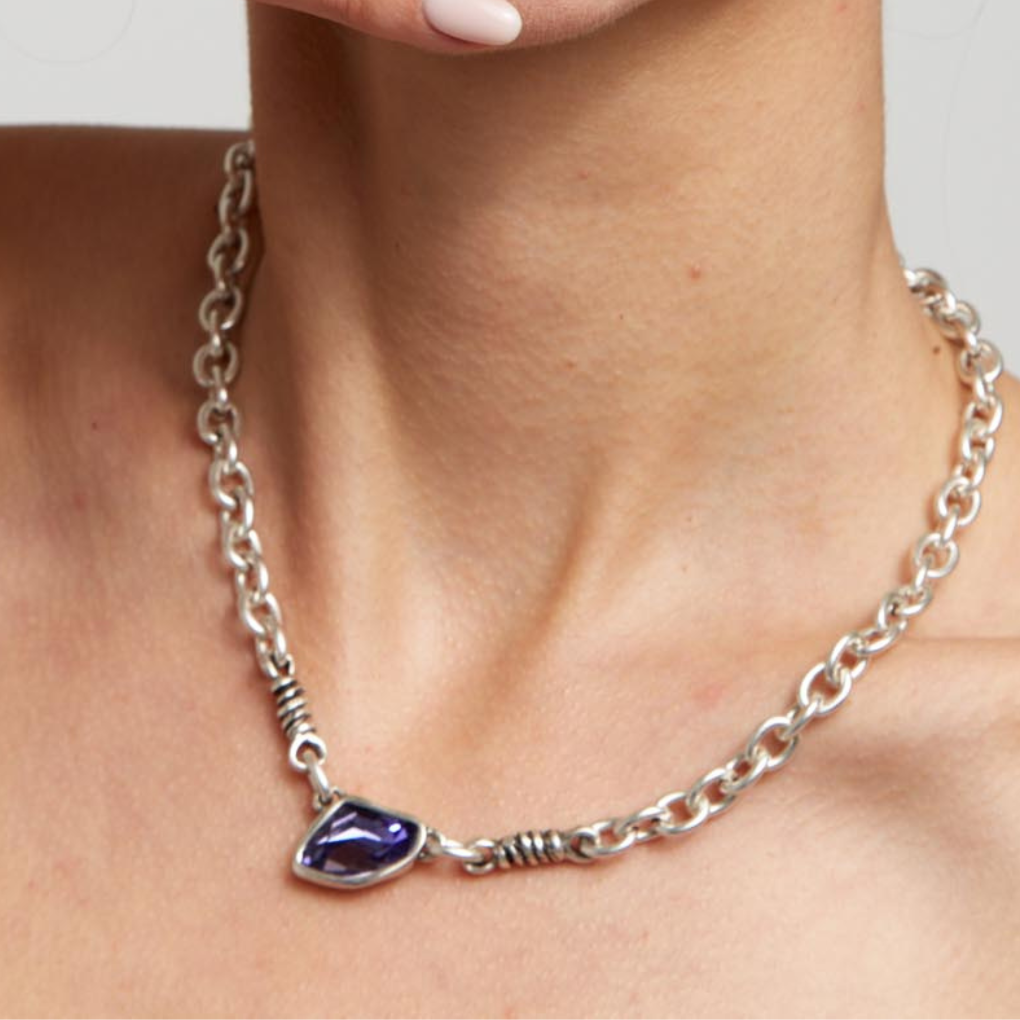 Handmade purple crystal pewter necklace by Chanour featuring a detailed crystal and pewter pendant on a chain.