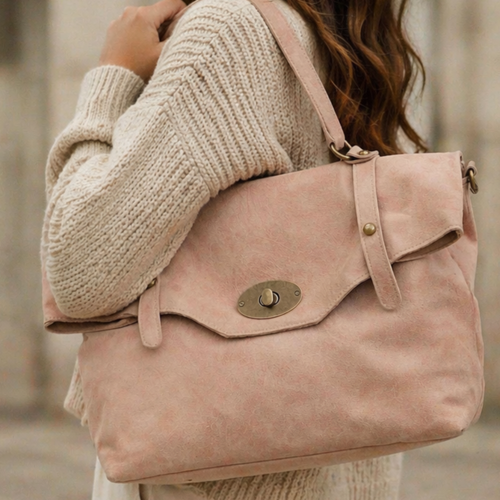 Private label Postina Leonardo Ele crossbody handbag with adjustable strap and top zipper closure, made of durable leather.