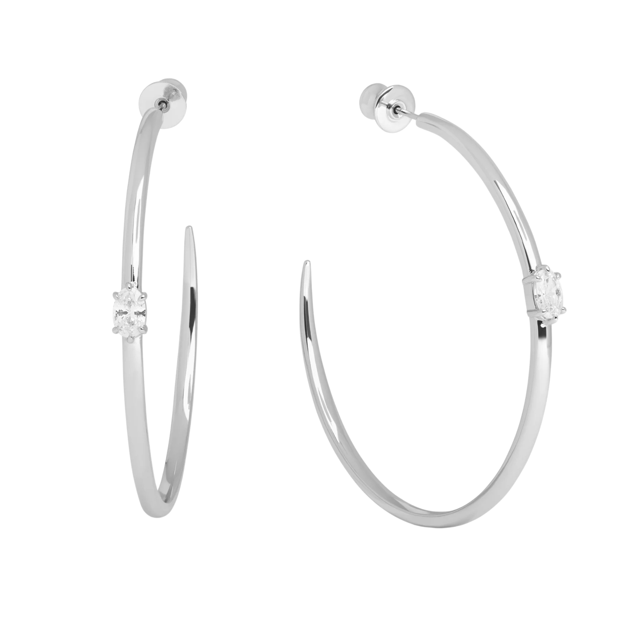 Melinda Maria She's on Point Hoops earring, 2-inch gold hoop earrings with a sleek, polished finish, styled on a model.