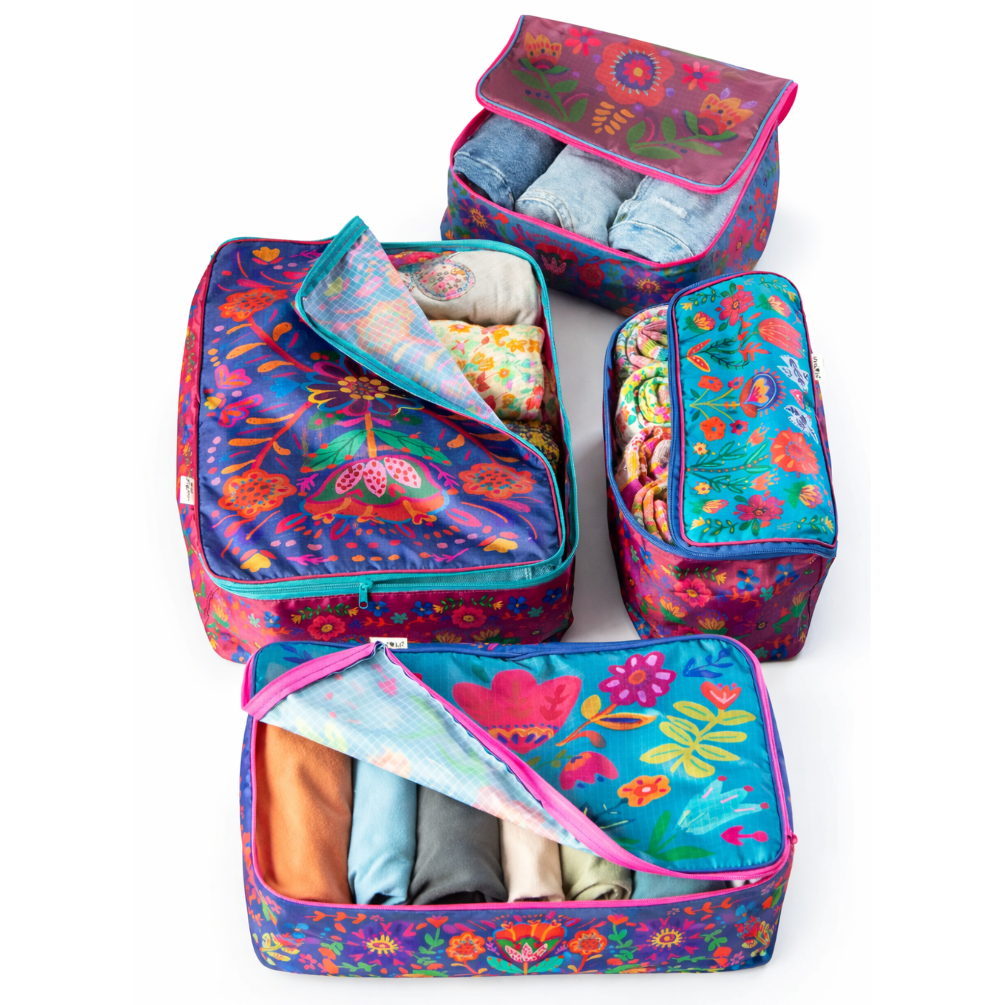Set of 4 Natural Life travel packing cubes featuring a multi folk flower design for organized packing.