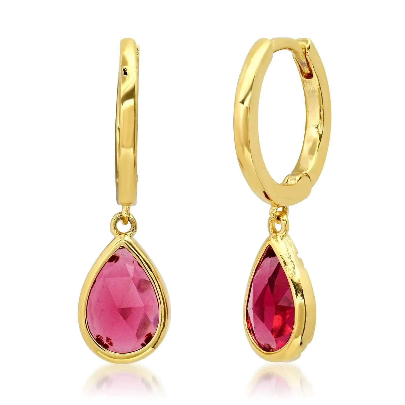 Close-up of Tai Jewelry huggie earring with bezel set pear-shaped charm in silver, showcasing elegant jewelry design