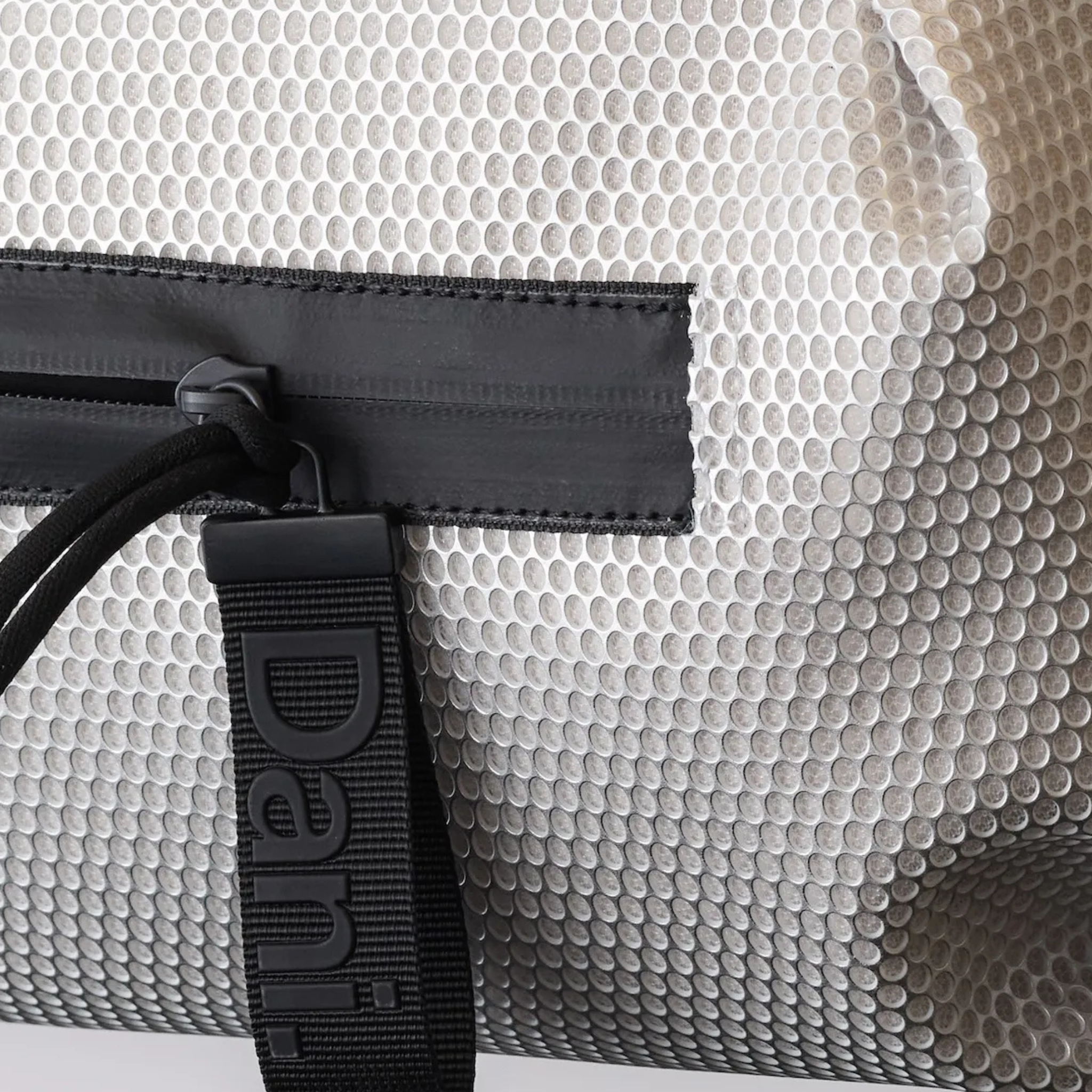 Daniella Lehavi Bonnie Crossbody bag with sleek design, featuring a black leather strap and minimalist aesthetic.