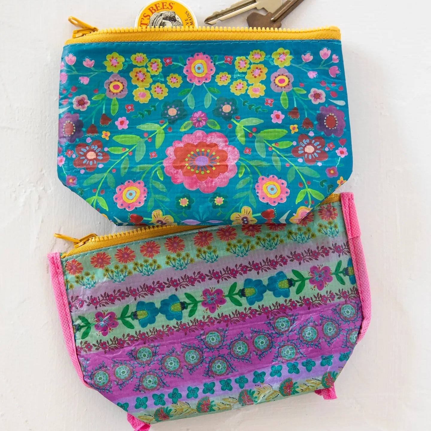 Small recycled zipper pouch by Natural Life featuring a colorful design and eco-friendly materials.