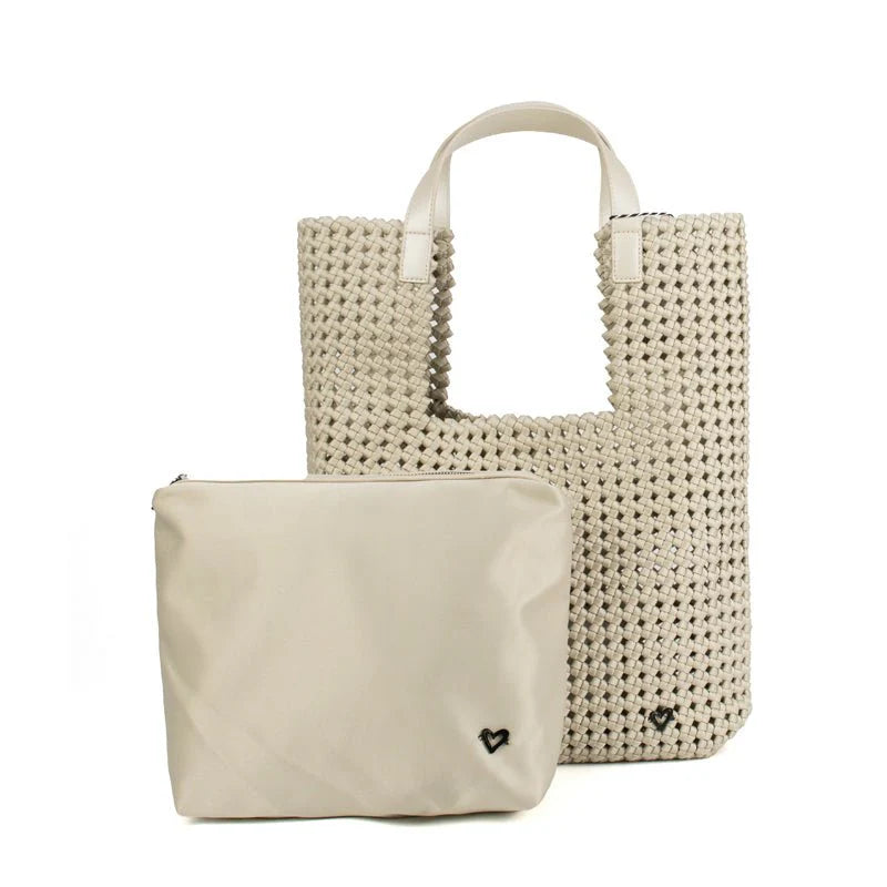 Beige woven handbag and pouch on a white background