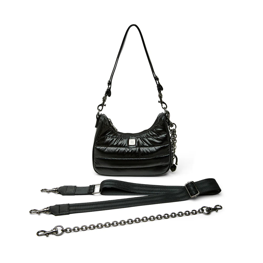 Black quilted handbag with detachable chain strap on a white background think royln soulmate