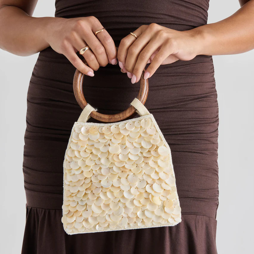 Natural sequin Allegra handbag by Dolce Vita, featuring a stylish design and intricate sequin detailing.