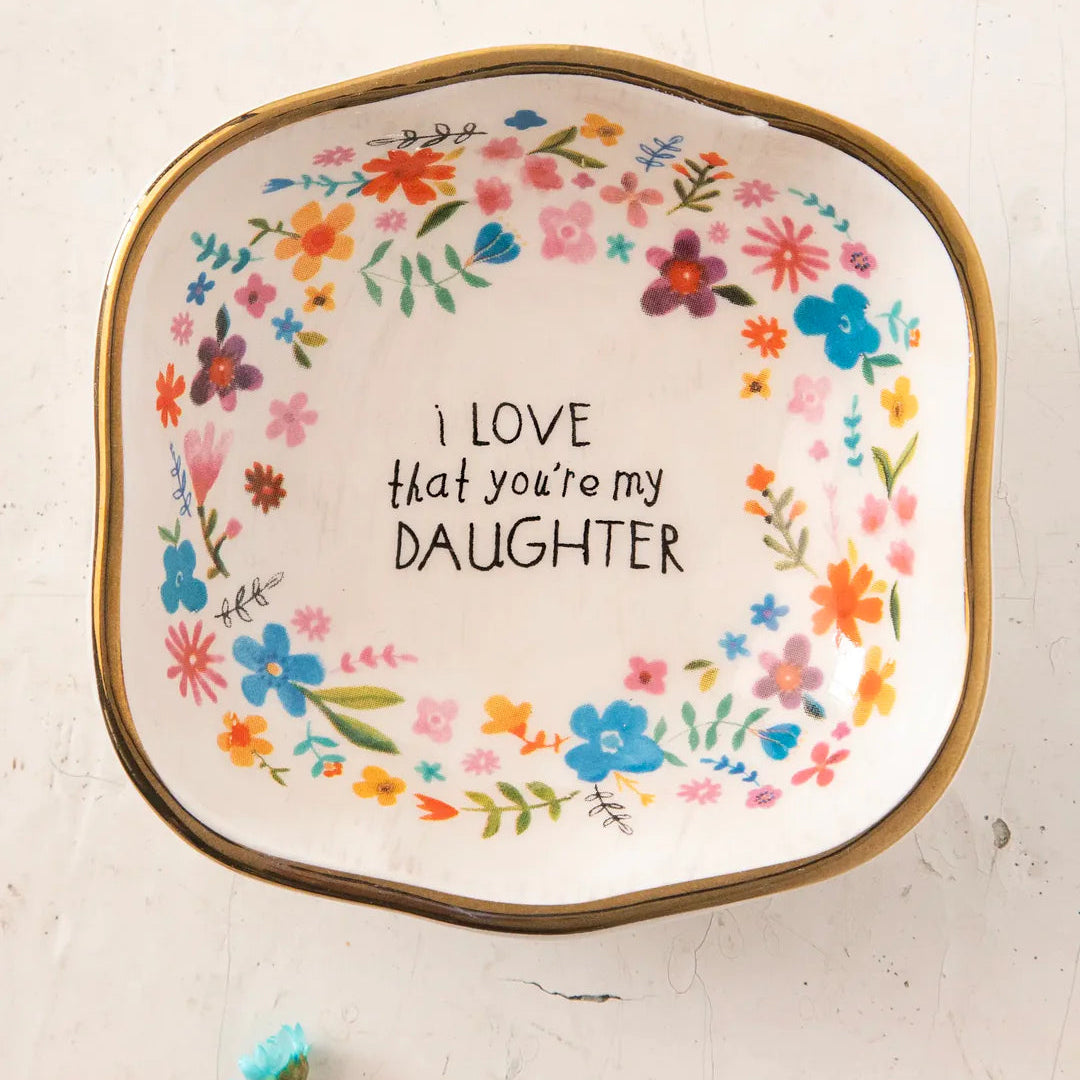 Antiqued trinket bowl by Natural Life, featuring intricate designs and a vintage finish, perfect for holding small items.