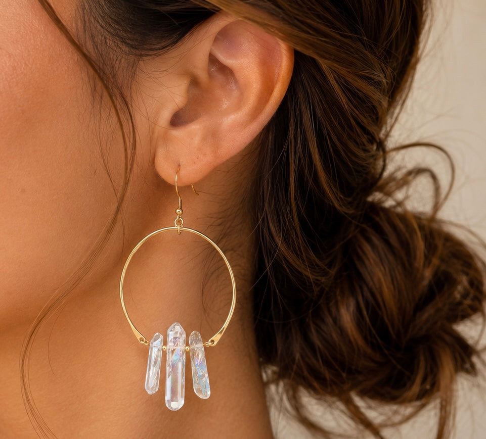 Luna Norte Quartz Nova earrings featuring clear quartz stones set in elegant metal earring settings.