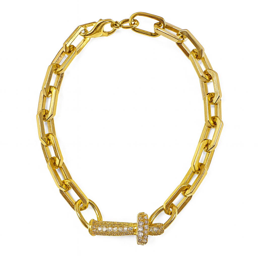 Gold chain bracelet with a bar clasp on a white background