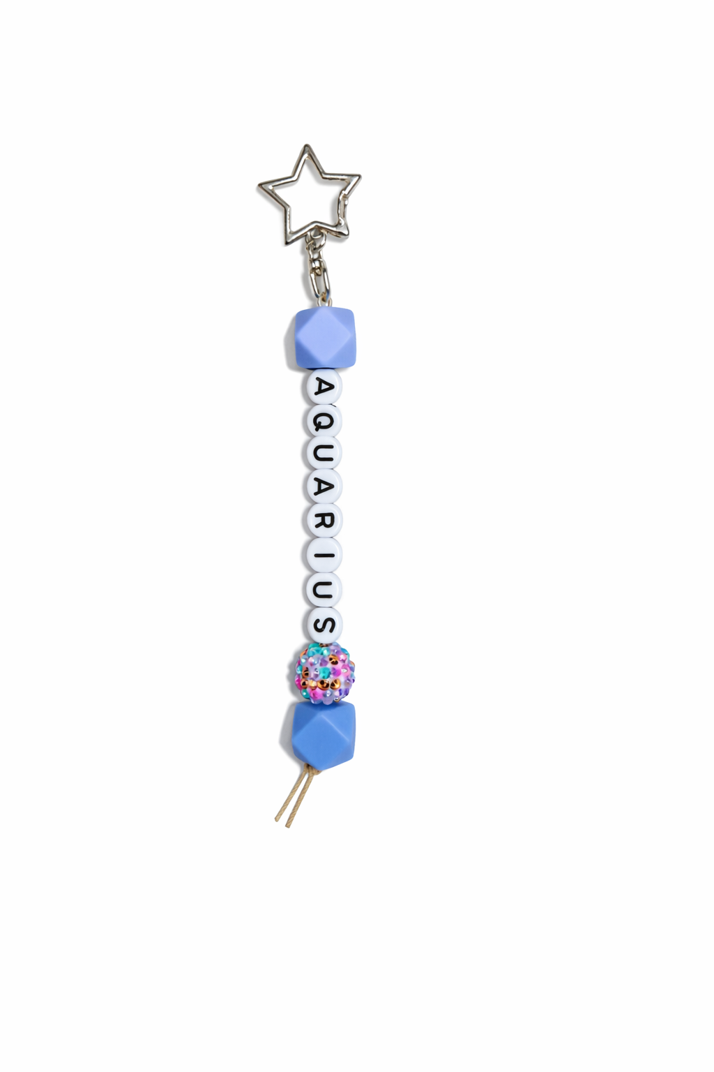 Jules by the Sea Zodiac keychain featuring a detailed celestial star design on a metal keychain.