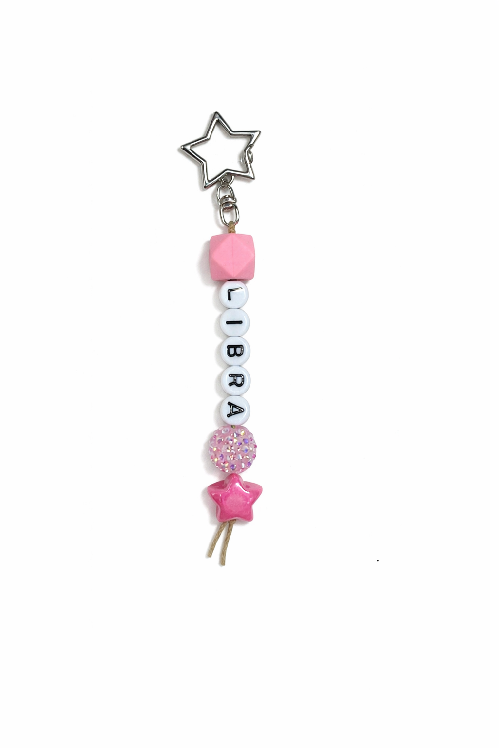 Close-up of Jules by the Sea Libra zodiac beaded keychain charm with intricate beadwork and a metal zodiac symbol.