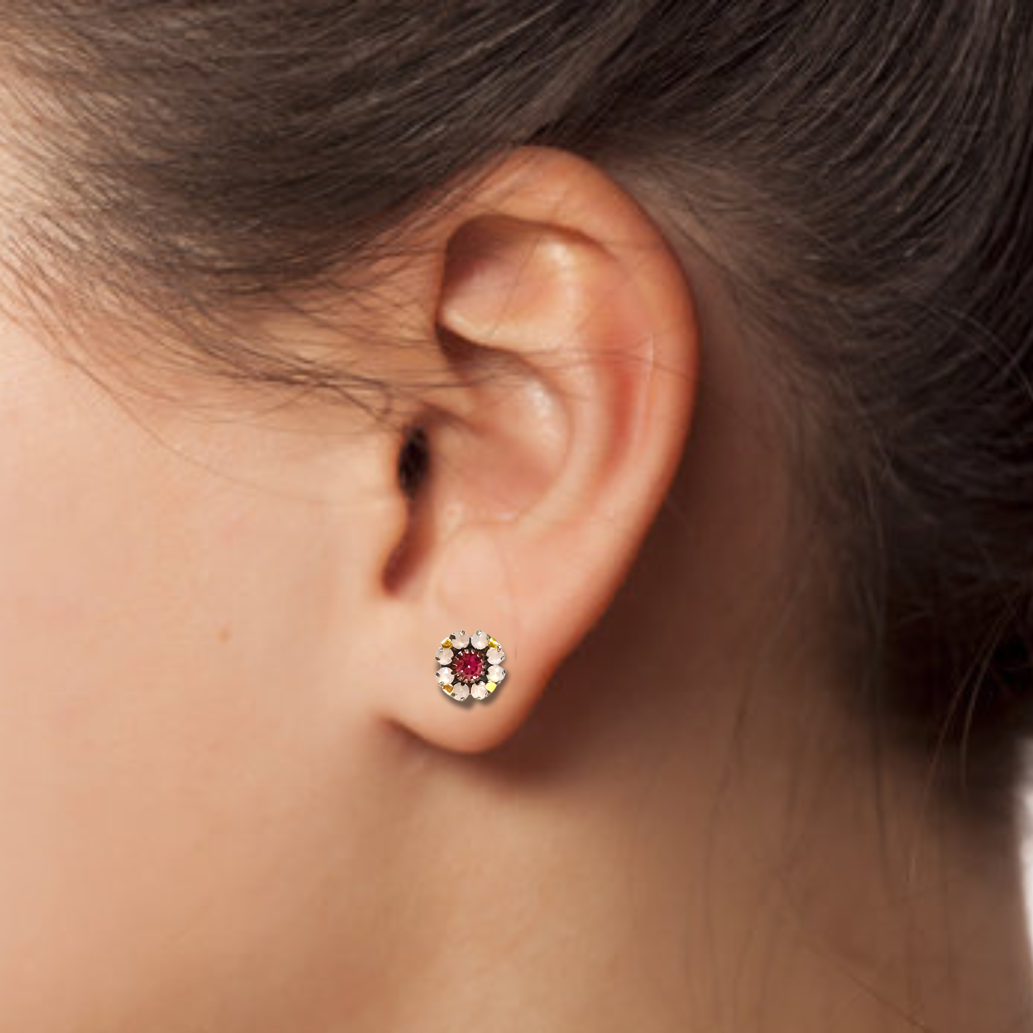 Floral earring studs featuring colorful flower designs on a polished metal base, perfect for adding a touch of elegance.