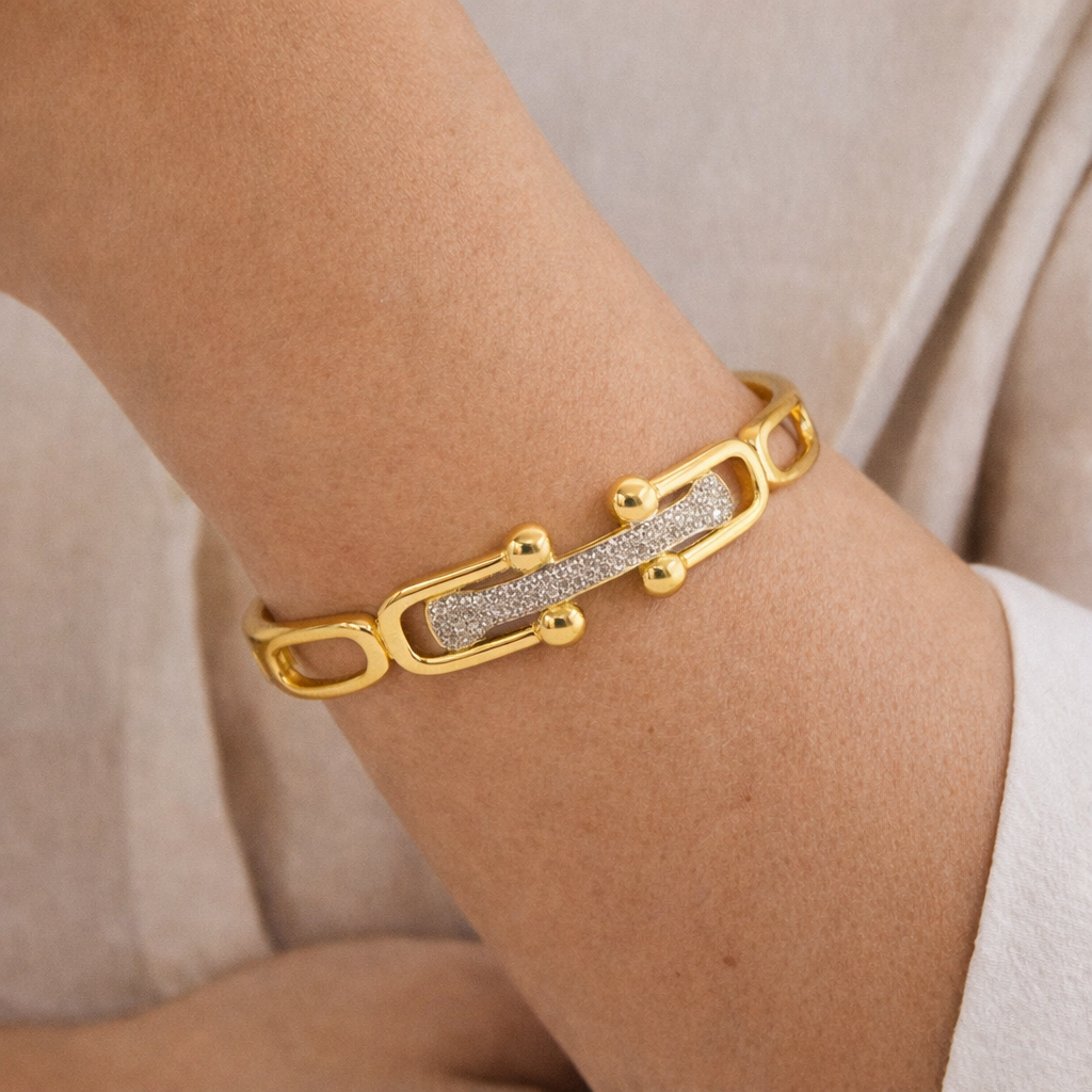 Linked up bangle bracelet by Private label, showcasing a sleek design with interlocking links in a polished finish.