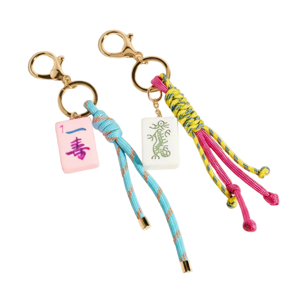 Mahjong tile knot strap drop keychain bag charm with decorative design, ideal for accessories and apparel.