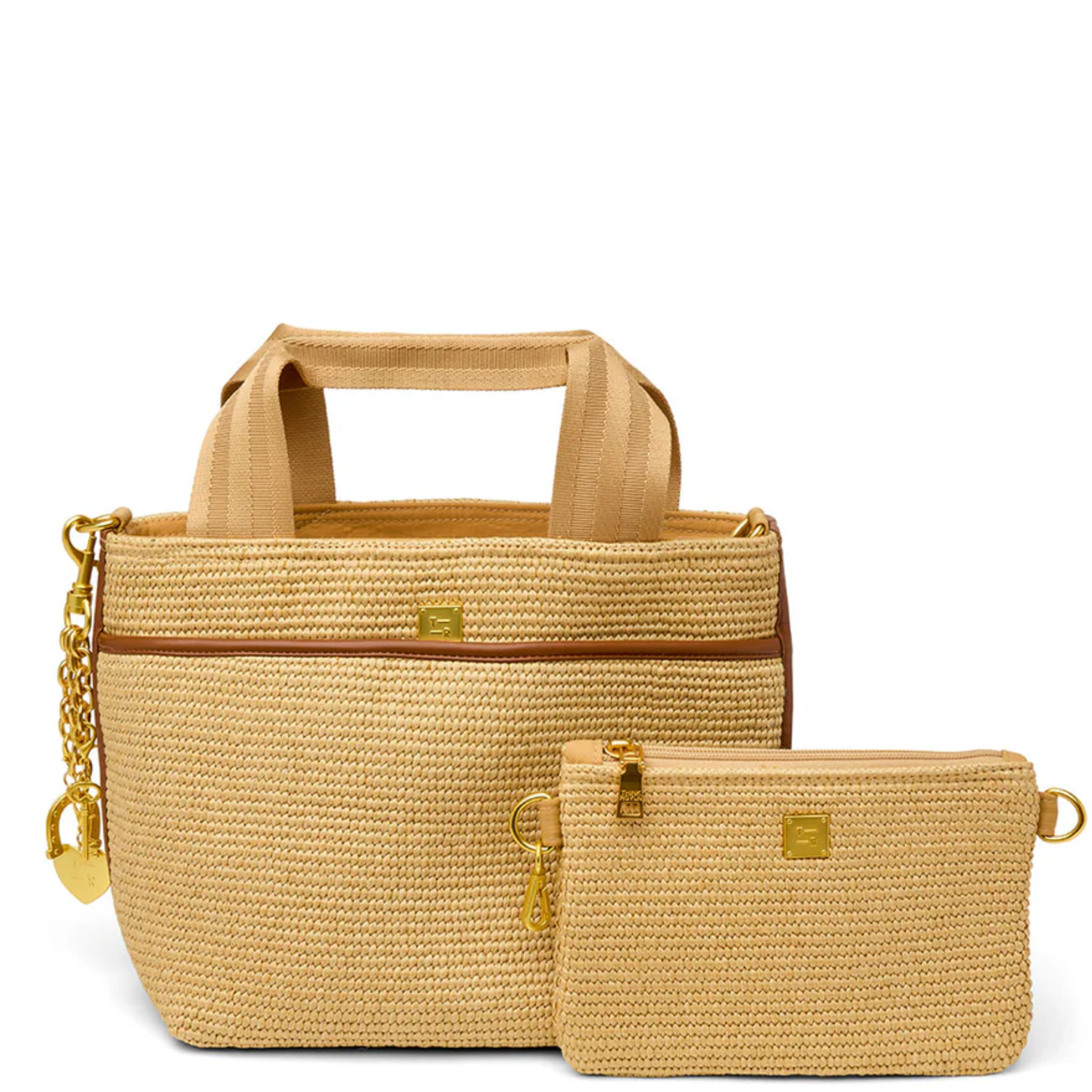 Think Royln Escape crossbody bag with heart and bow charm, showcasing a stylish design and vibrant colors.