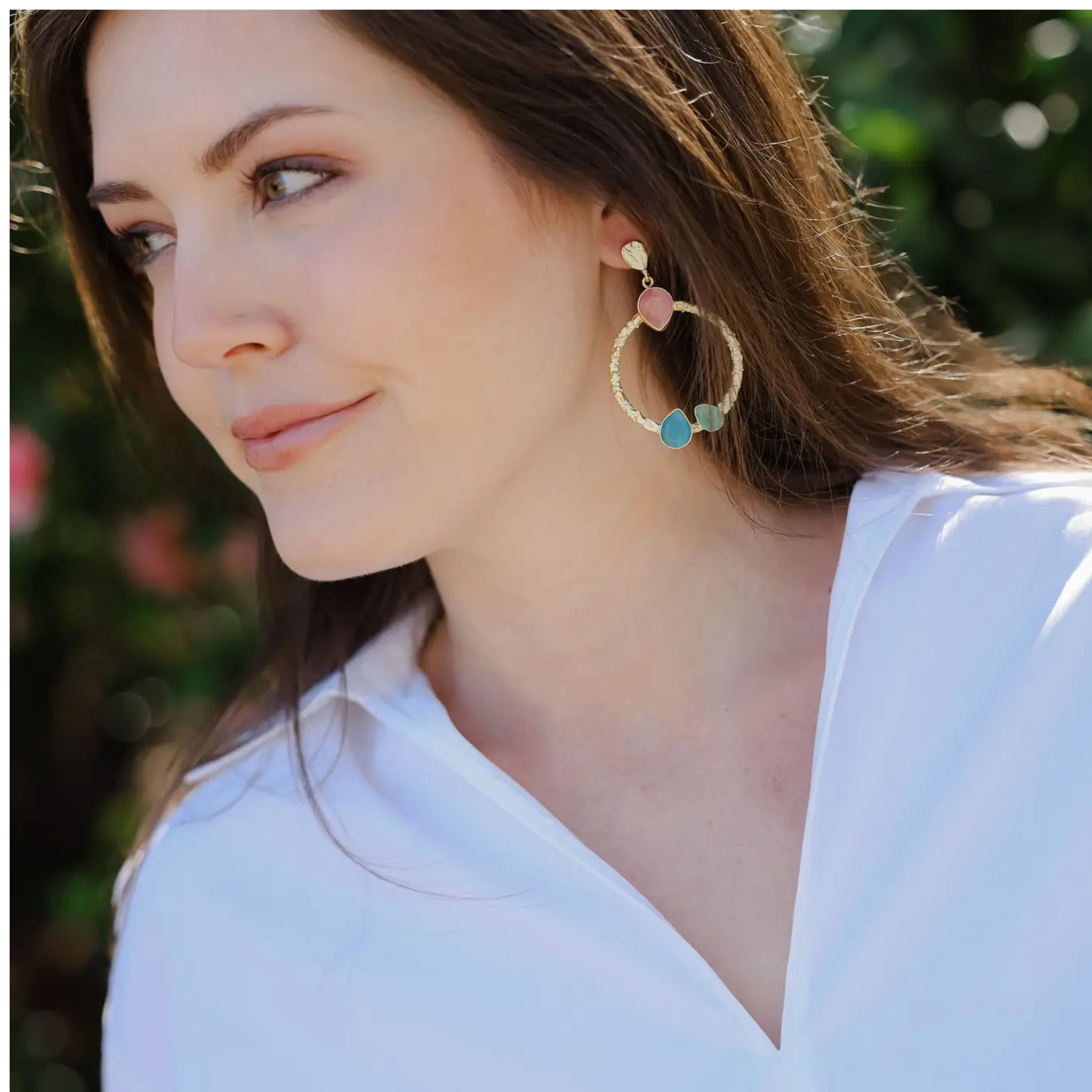 Colorful gemstone earrings with multicolored stones, designed by Private Label, showcasing vibrant, elegant jewelry style.