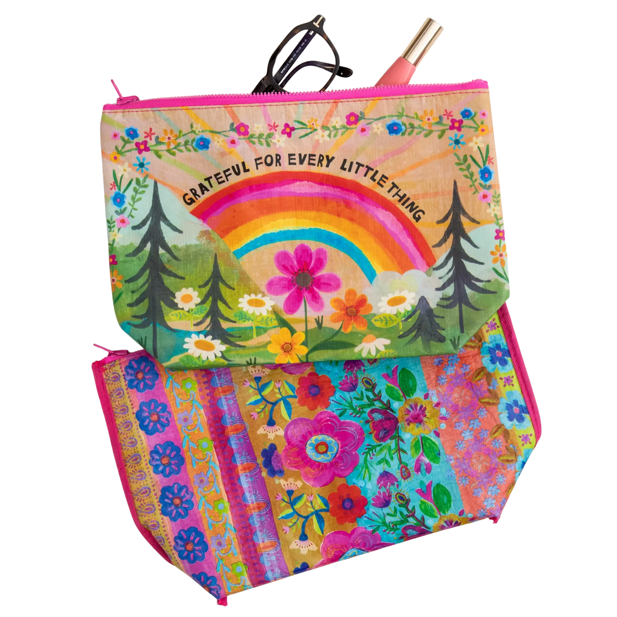 Natural Life recycled reversible zipper pouch in colorful patterns, showcasing its dual-sided design and sturdy zipper.