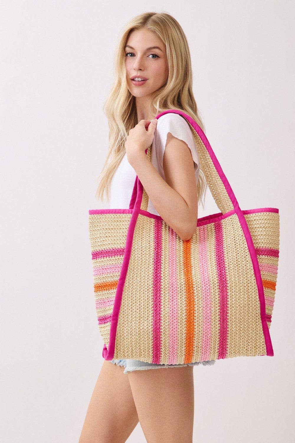 Jennifer multi-color straw beach tote bag with vibrant patterns and spacious interior for summer outings.