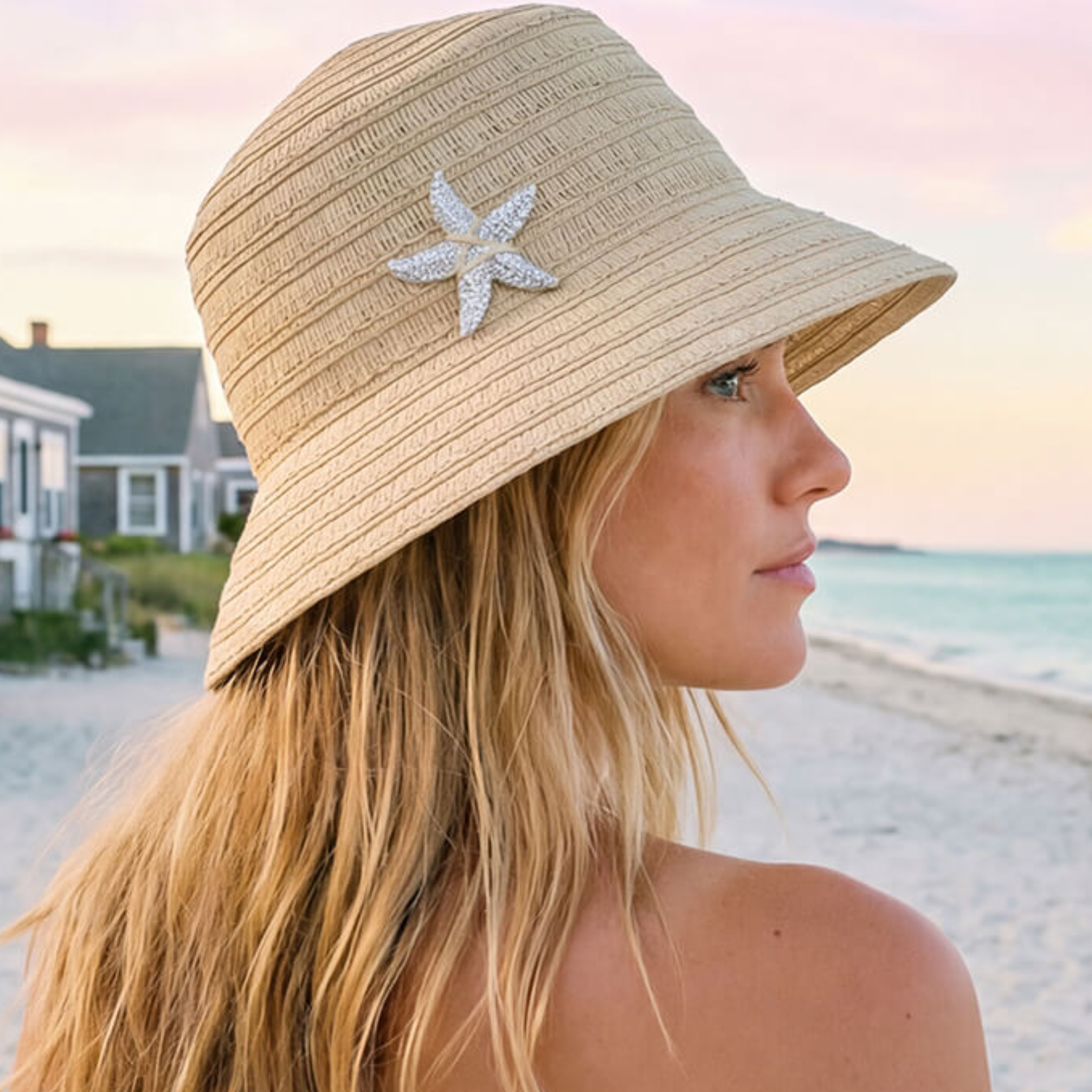 Sun N Sand women's bucket hat with metal starfish detail, adjustable brim, UPF 50+ sun protection, lightweight and stylish.