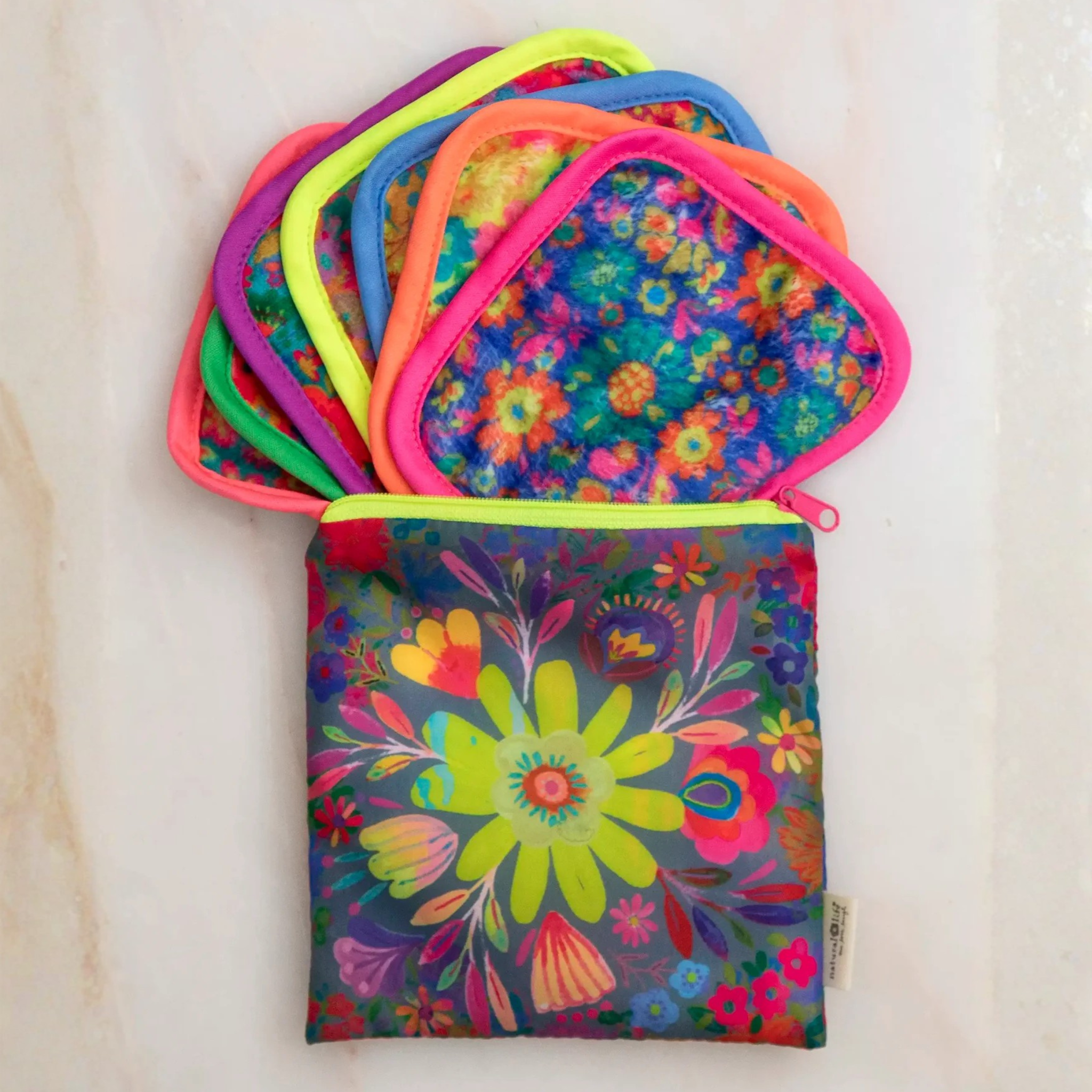 Natural Life floral mini makeup removing cloths set displayed on a light background, showcasing vibrant patterns and textures.