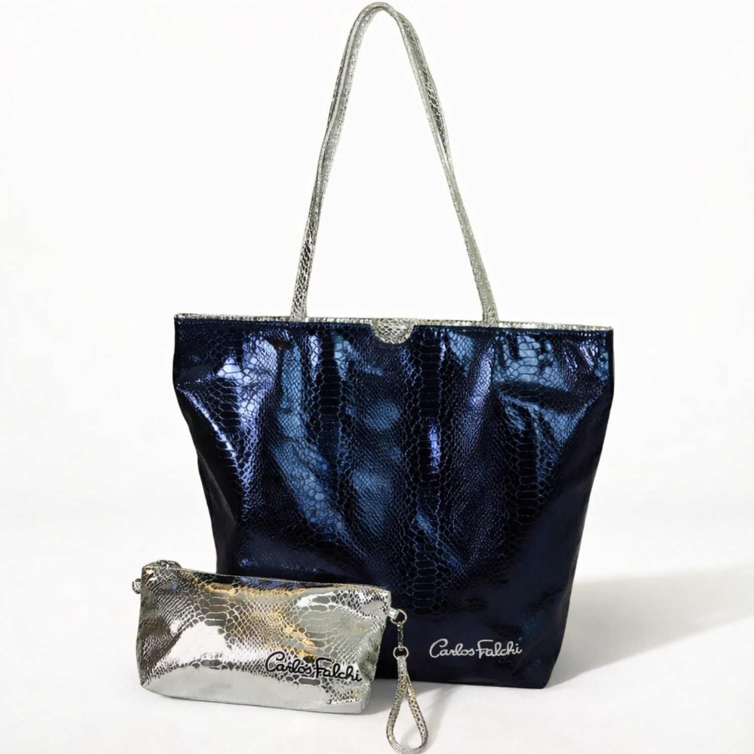 Carlos Falchi vegan python tote bag with sleek design and sturdy handles, made from eco-friendly vegan leather.