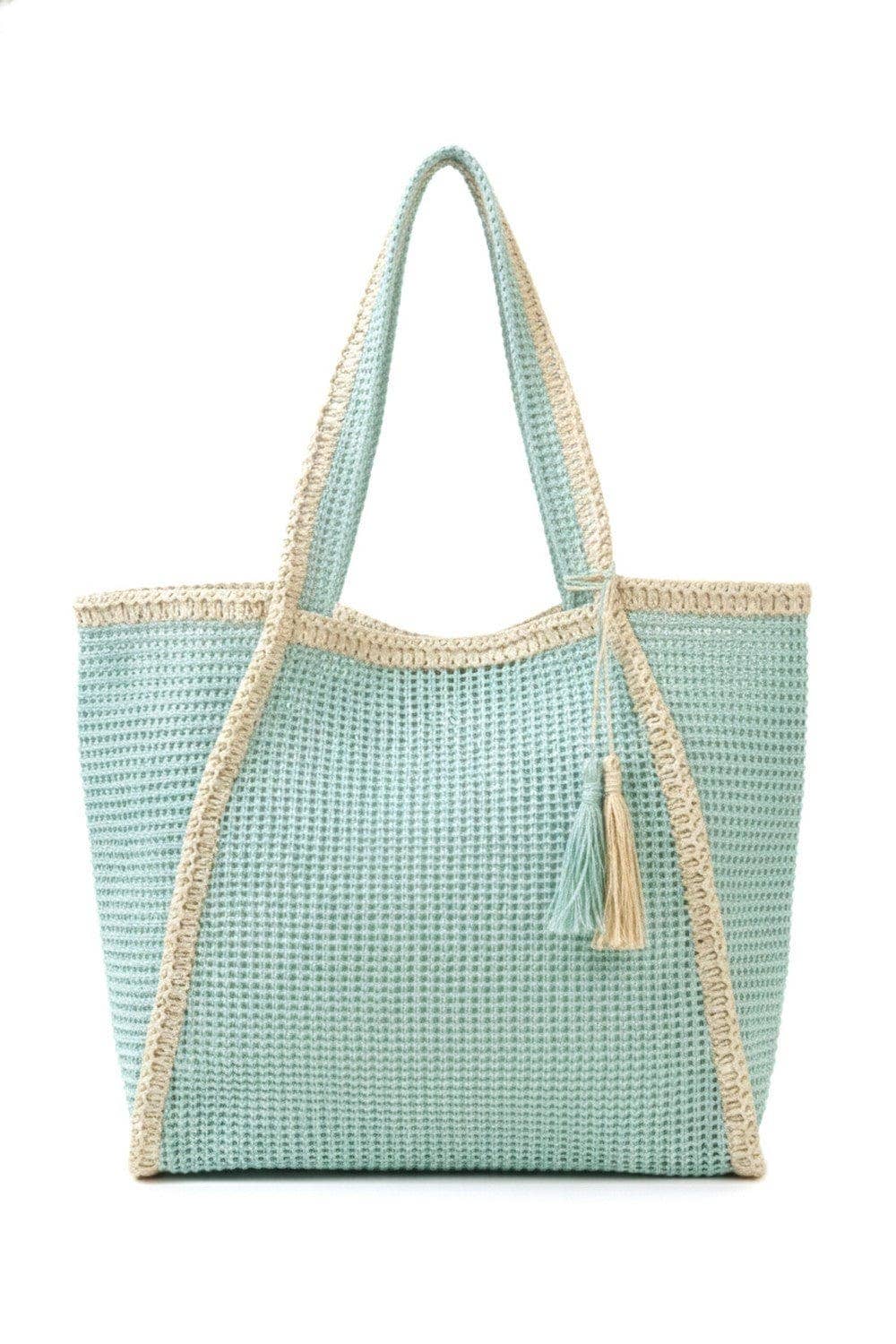 Two-tone woven straw beach tote bag with sturdy handles, perfect for summer outings and beach days.