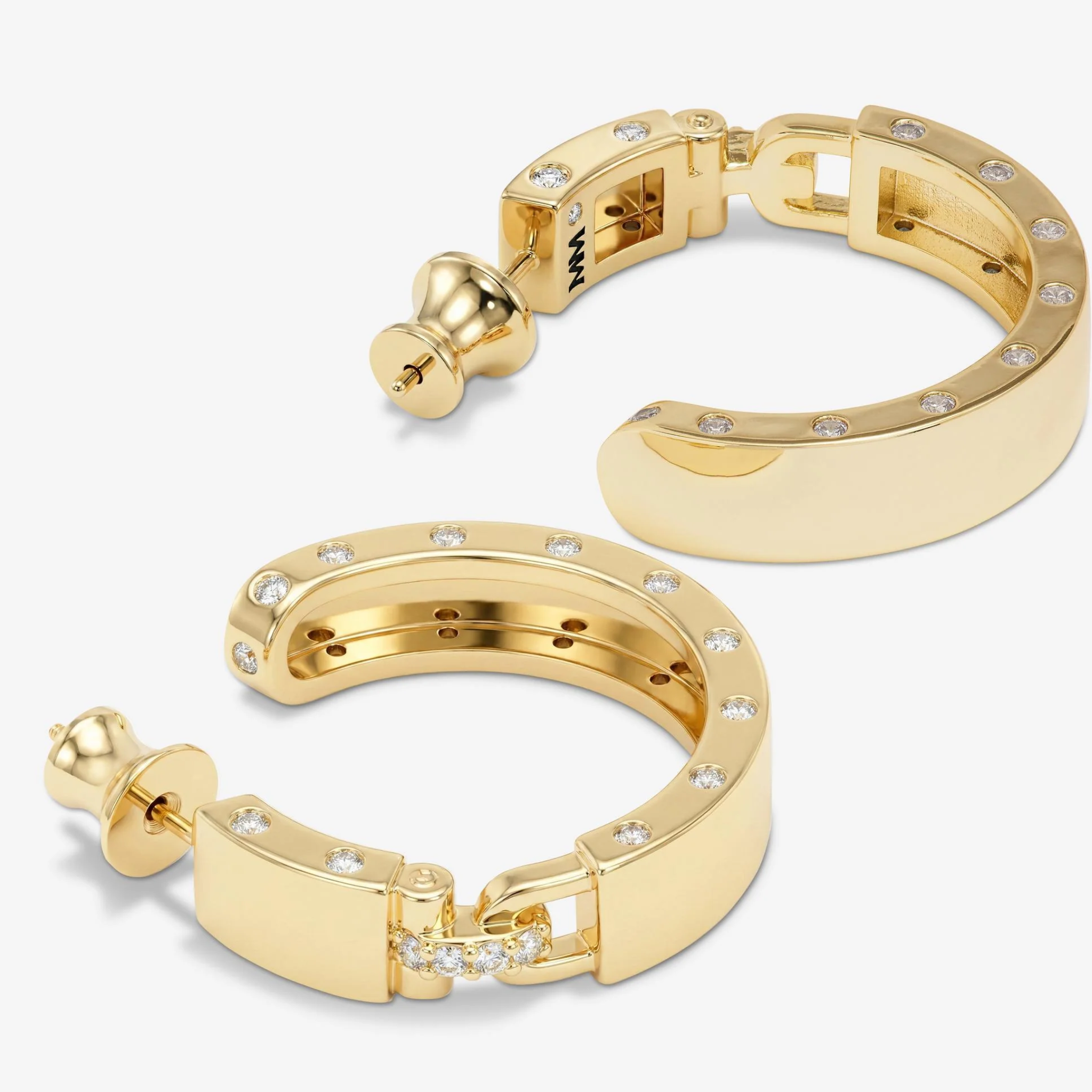 Gold Ashley Lock Hoops earrings with white diamondette accents by Melinda Maria, showcasing sleek 1-inch hoop design.
