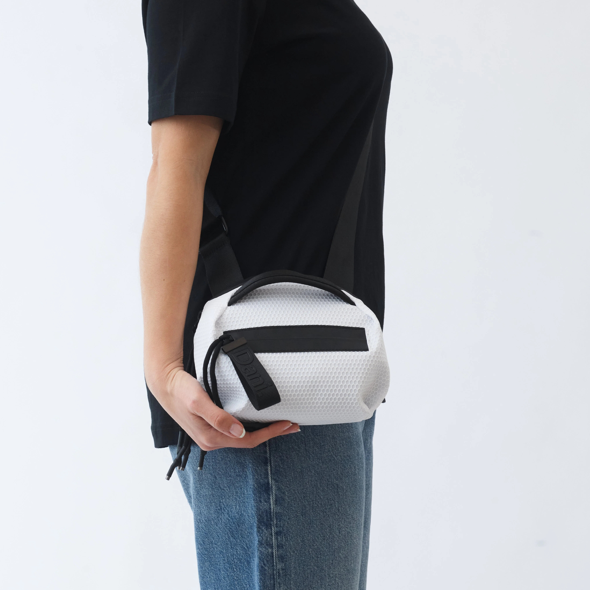 Daniella Lehavi Bonnie mini crossbody bag in sleek design with adjustable strap and compact size for everyday use.