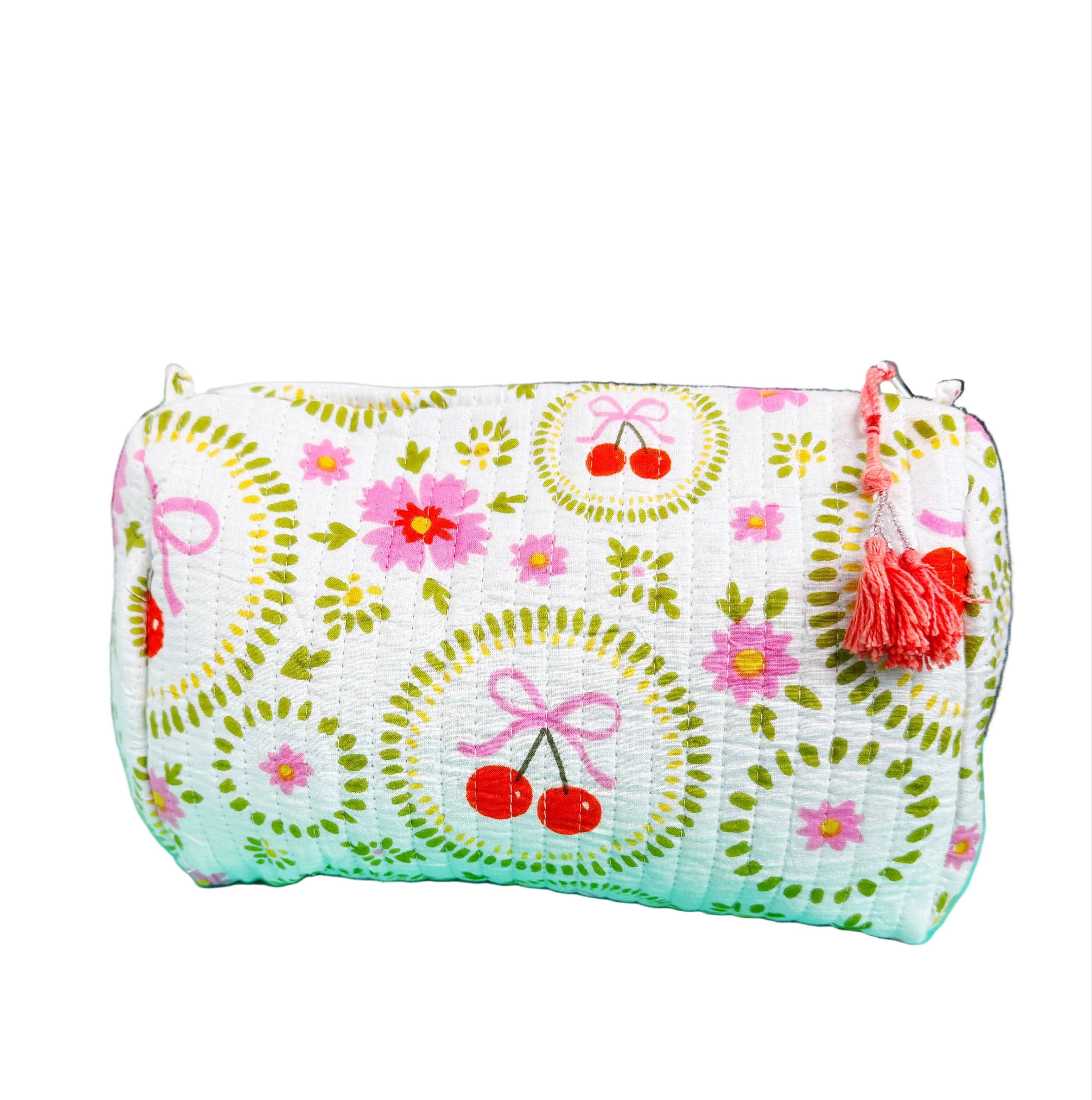 Quilted makeup bag by Folklore Couture featuring a white cherry and bow design, ideal for cosmetics and pouches.