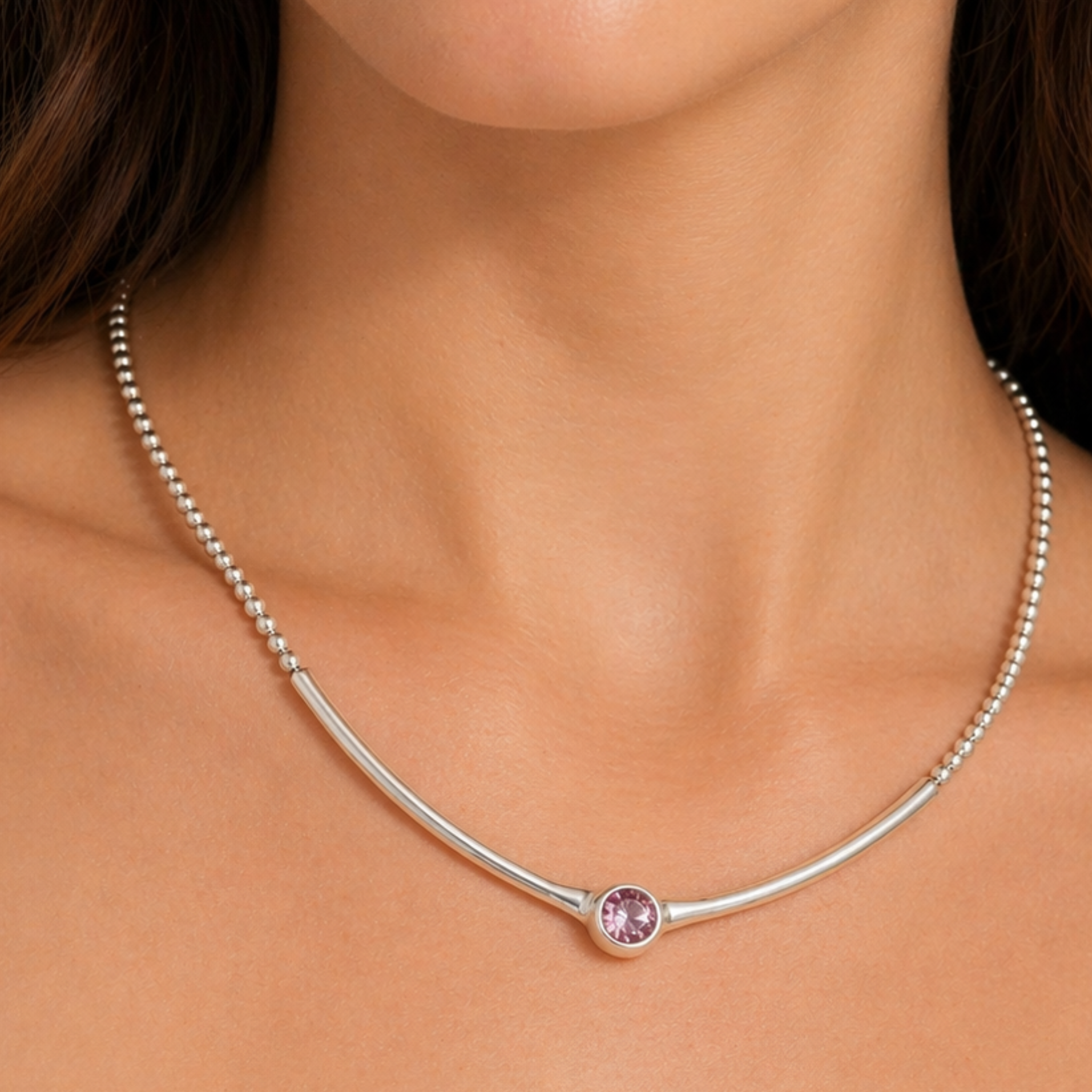 Chanour Solara Blush Necklace featuring a delicate pink pendant and silver chain, styled on a white background.