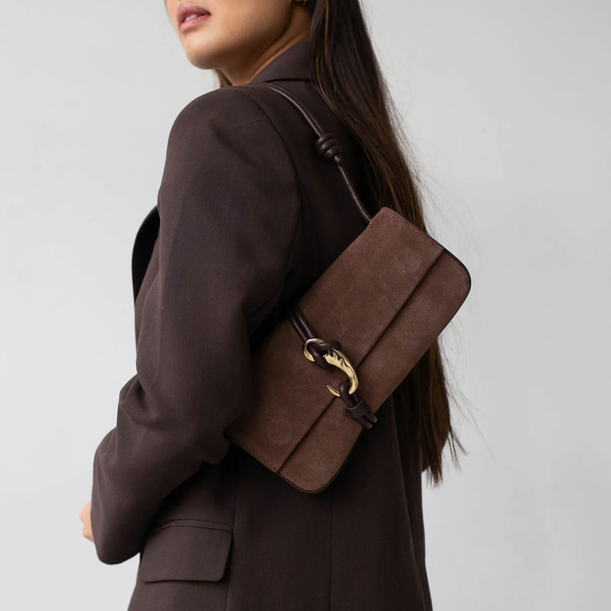 Dolce Vita Alice shoulder bag in a sleek, structured design with an adjustable strap