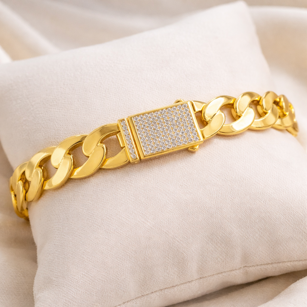 Cuban CZ bangle in gold with sparkling cubic zirconia accents, showcasing an elegant design and smooth finish.