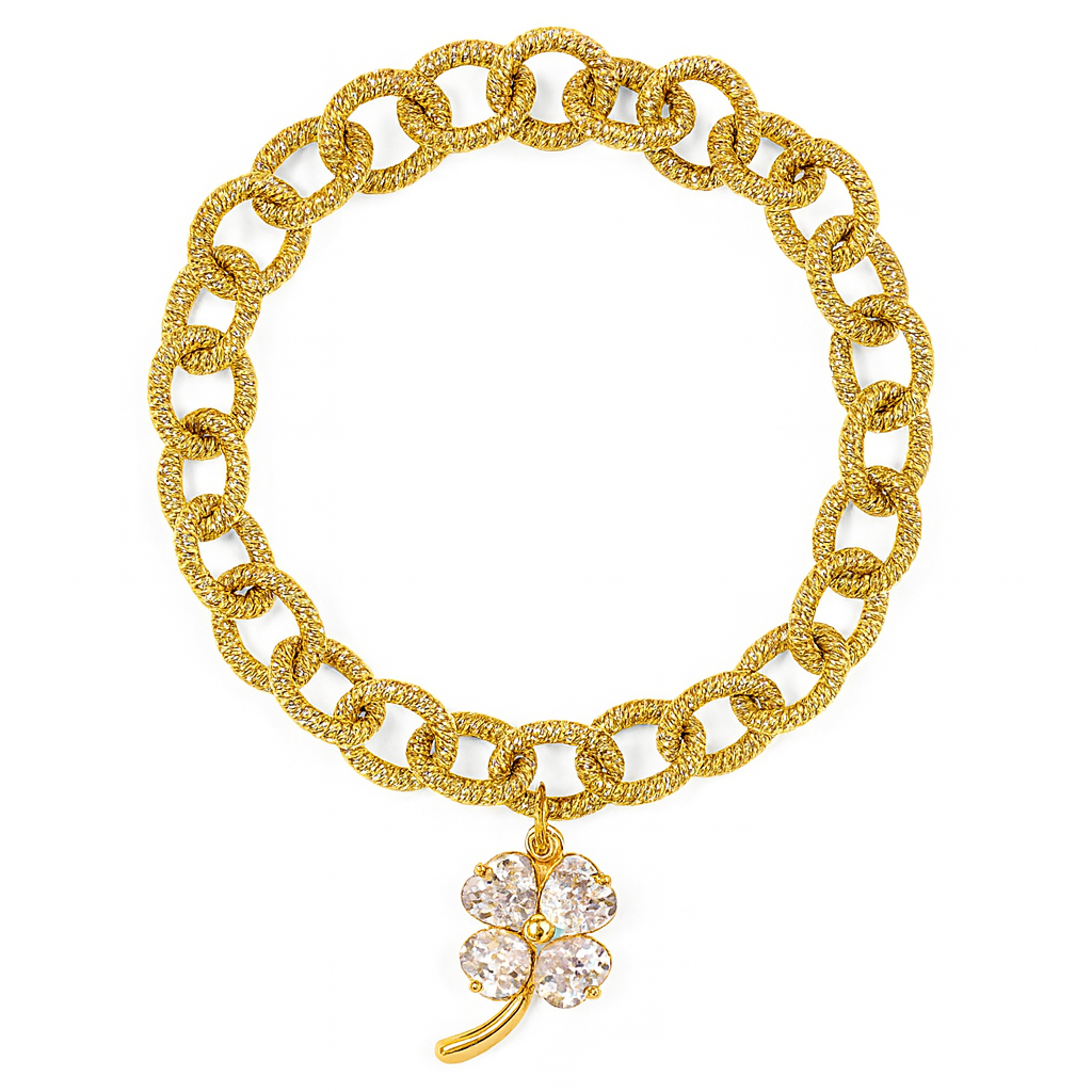 Gold chain bracelet with a clover charm on a white background