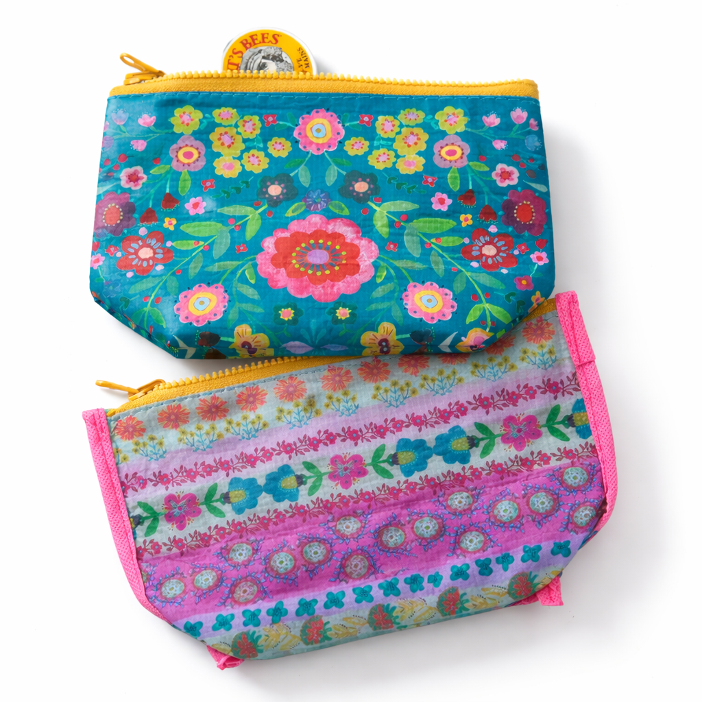 Small recycled zipper pouch by Natural Life in vibrant colors with a floral design and eco-friendly material.