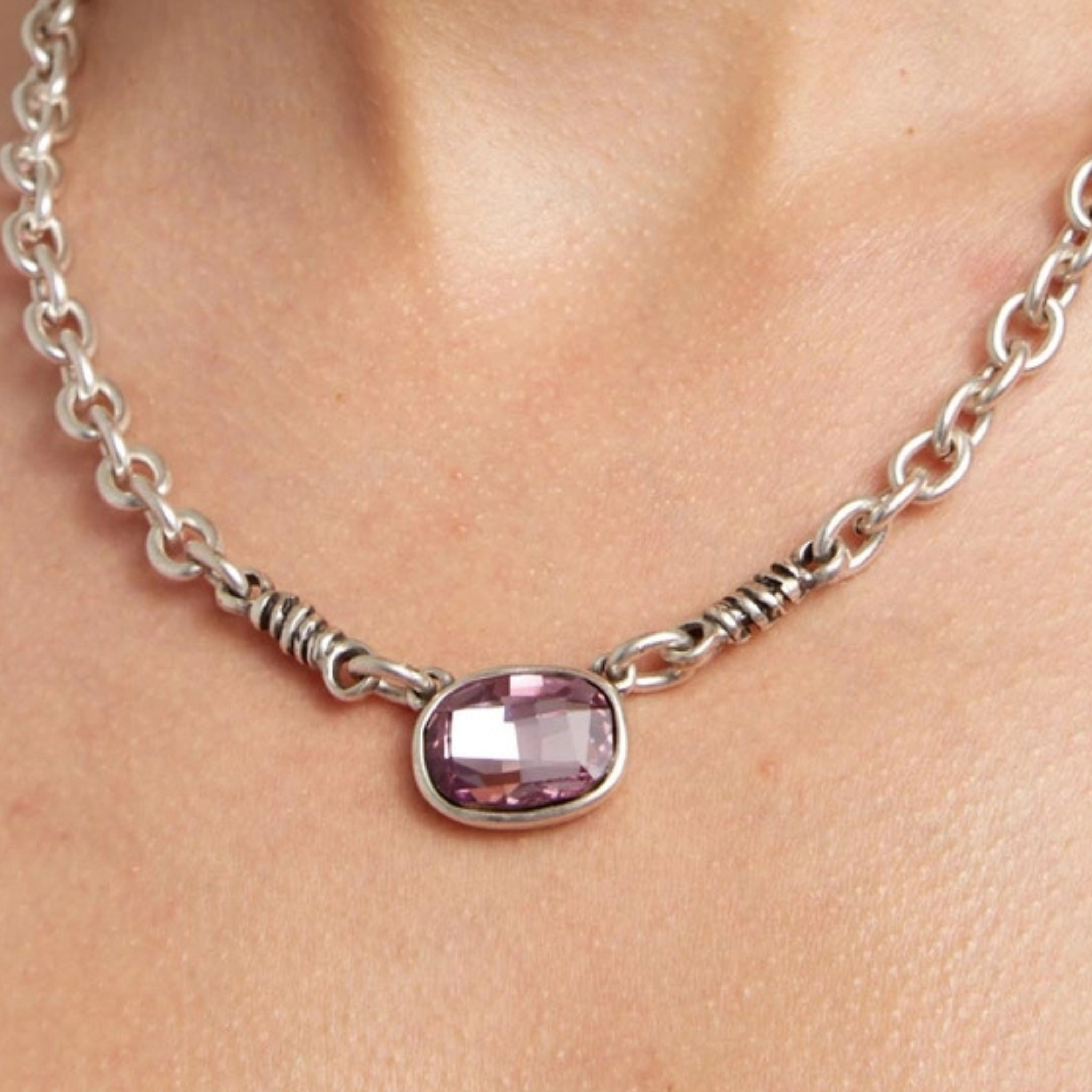 Handmade pink crystal pewter necklace from Chanour featuring a delicate pink gemstone pendant on a silver chain.