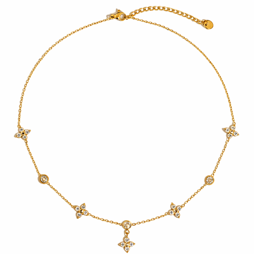 Aveline 18K gold chain necklace featuring a non-tarnish design with CZ floral accents, elegantly displayed on a neutral background.