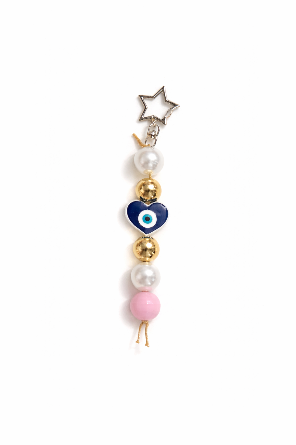 Jules by the Sea Evil Eye keychain and bag charm with blue and white design, attached to a metal keyring.