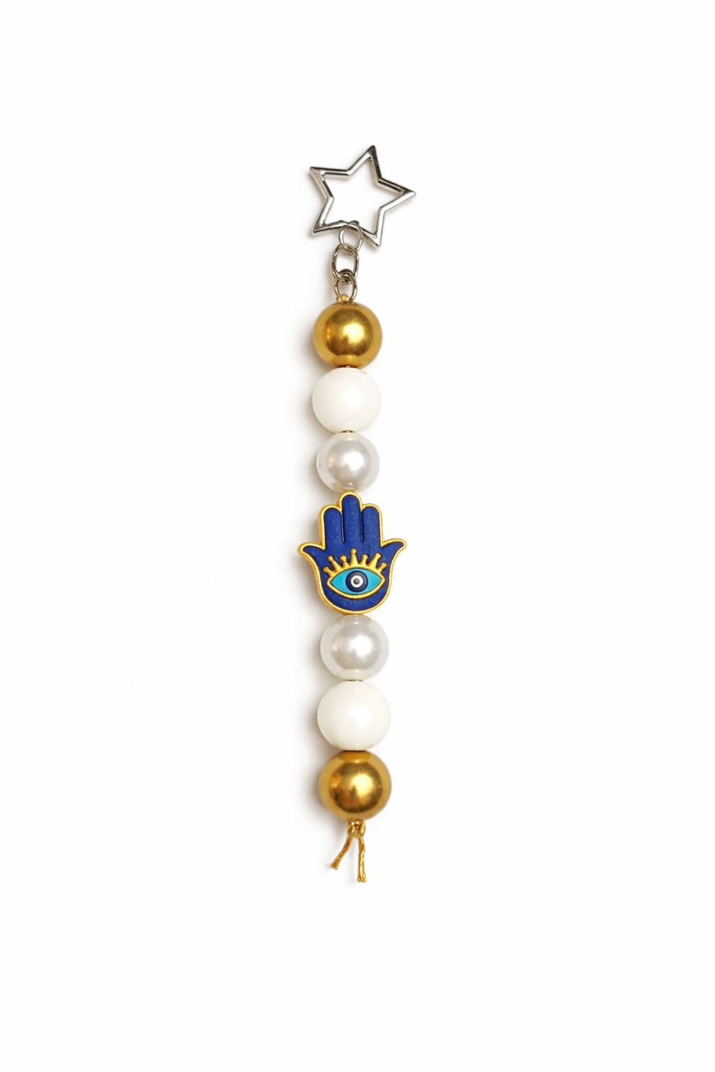 Jules by the Sea Evil Eye keychain bag charm with blue and white bead details, featuring a protective evil eye design.