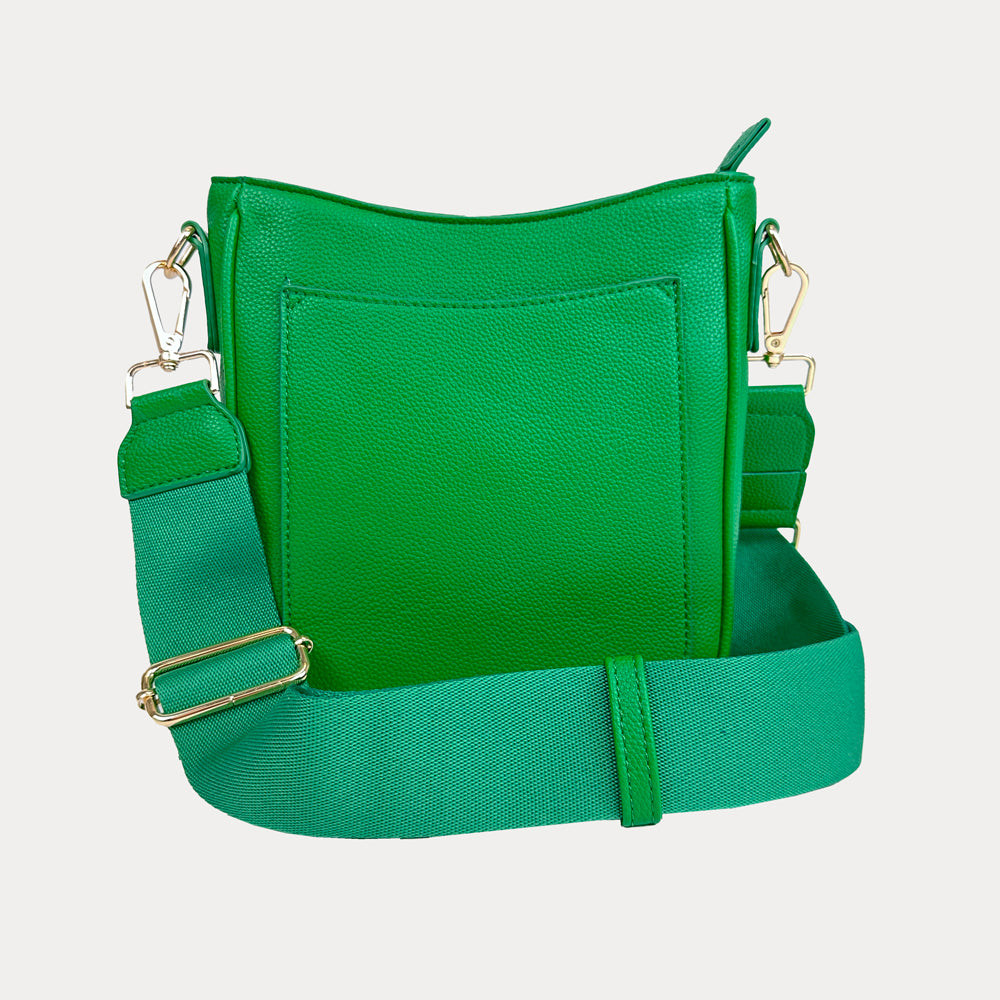 AHDORNED Madelyn vegan pebble leather messenger bag with adjustable strap and silver hardware on a plain background.