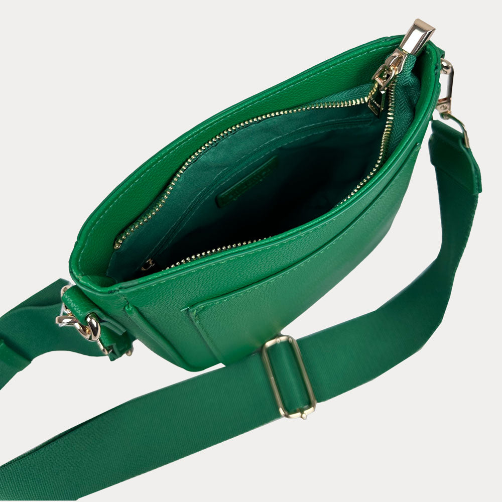 Inside view of the AHDORNED Madelyn vegan pebble leather messenger bag showing compartments and interior organization.